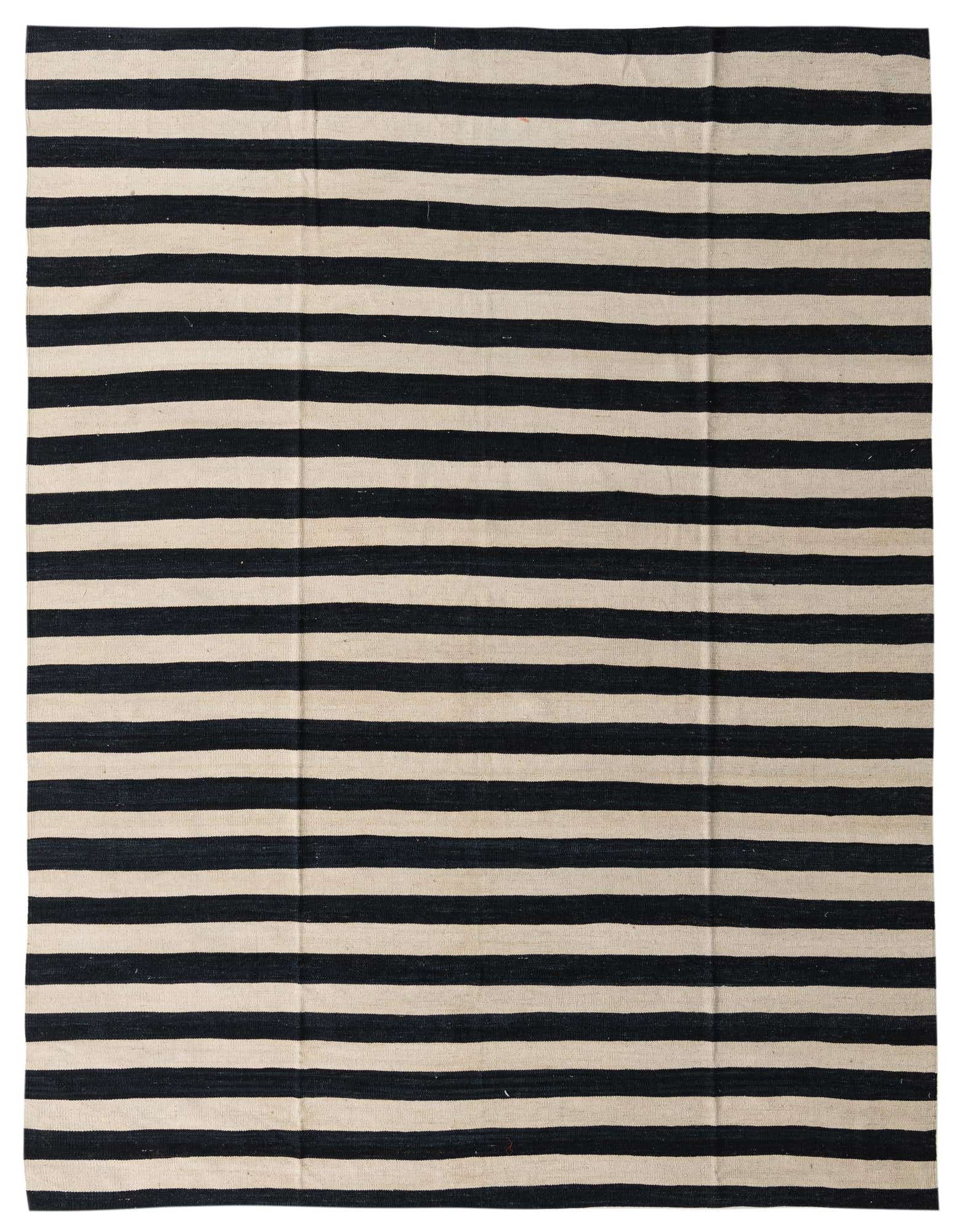 An 8x10 rectangular flatweave rug featuring bold horizontal black and ivory stripes, suitable for a modern living room.