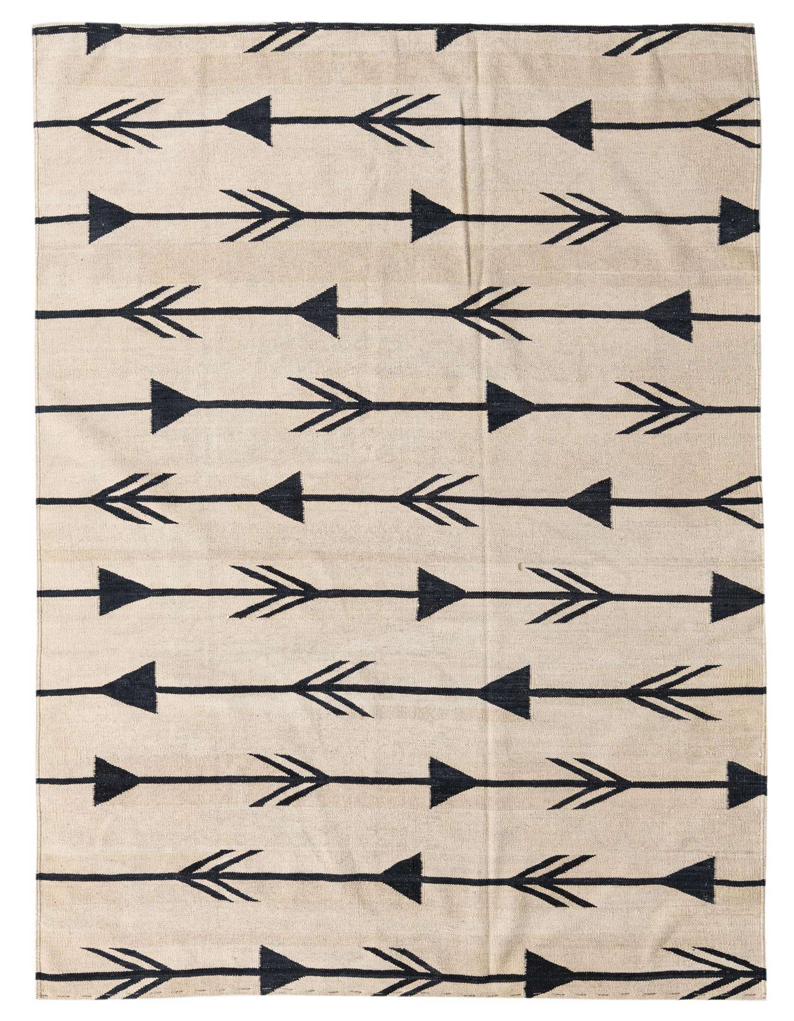 A 6x9 rectangular ivory flatweave wool rug with a modern tribal arrow pattern in black, suitable for a living room.