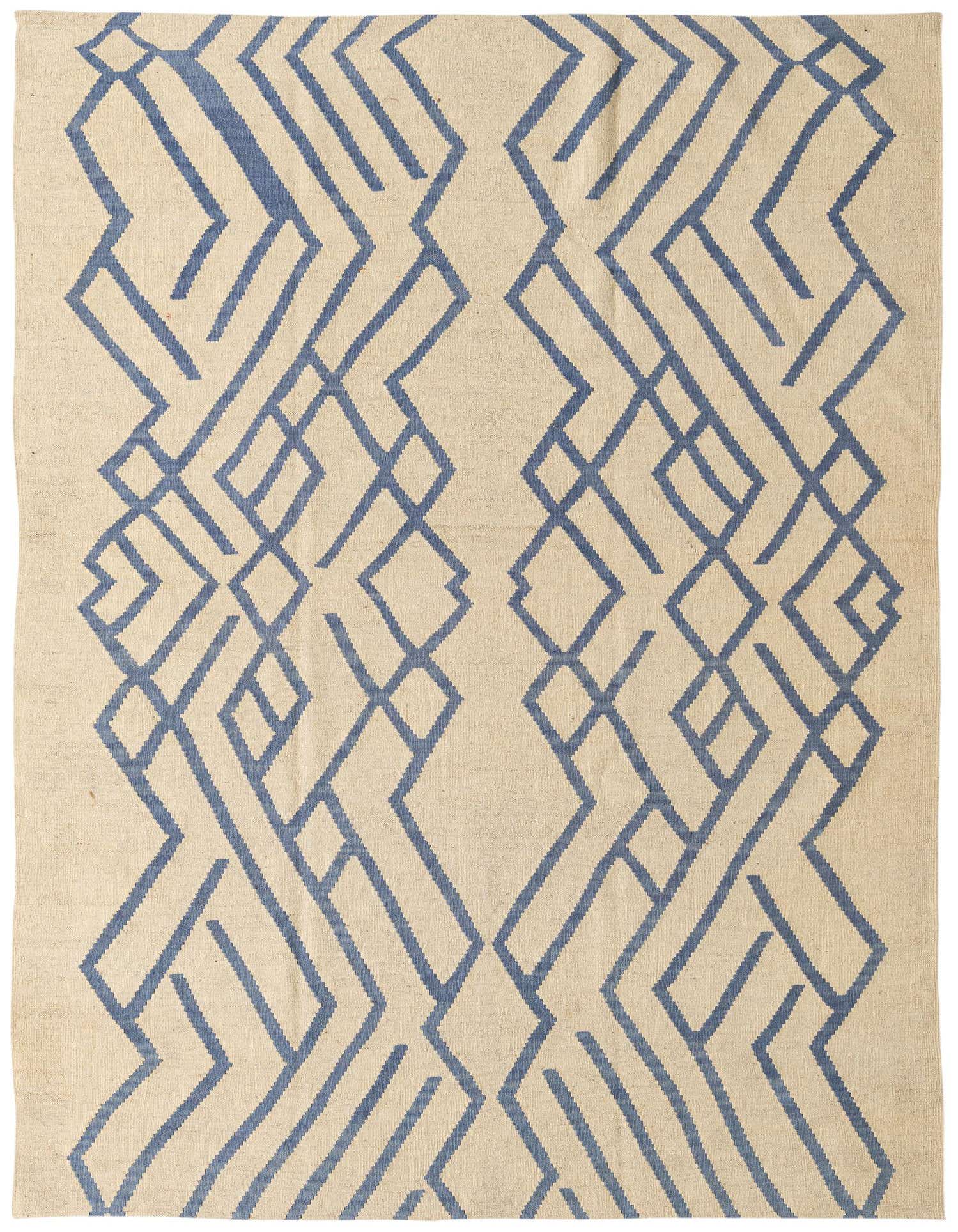 A 6x9 rectangular Kilim Modern wool rug featuring a bold blue tribal geometric pattern on an ivory background.