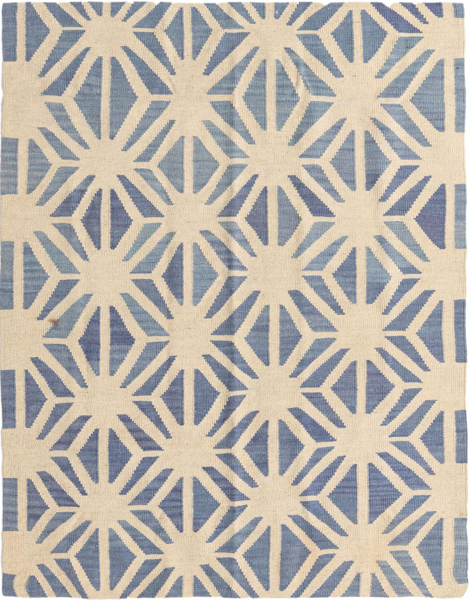 A 4x6 rectangular Kilim Modern rug with an ivory background and a repeating blue geometric tribal pattern.