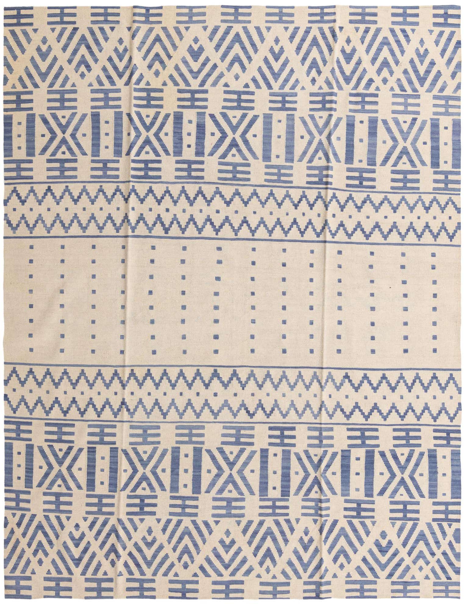 An 8x10 rectangular ivory and blue flatweave rug with tribal patterns, suitable for a living room.