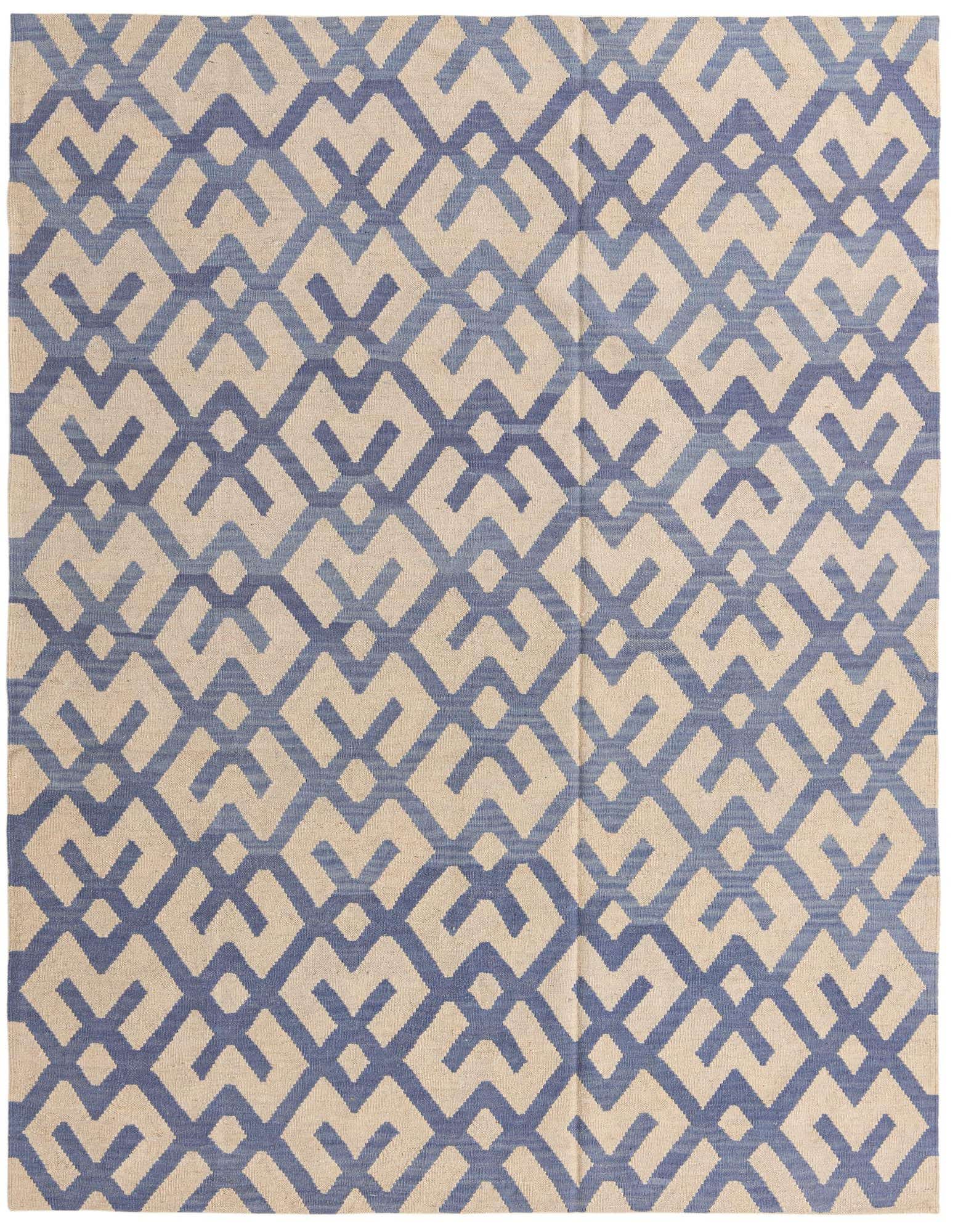 A 6x9 rectangular ivory and blue flatweave wool rug with a modern tribal geometric pattern.