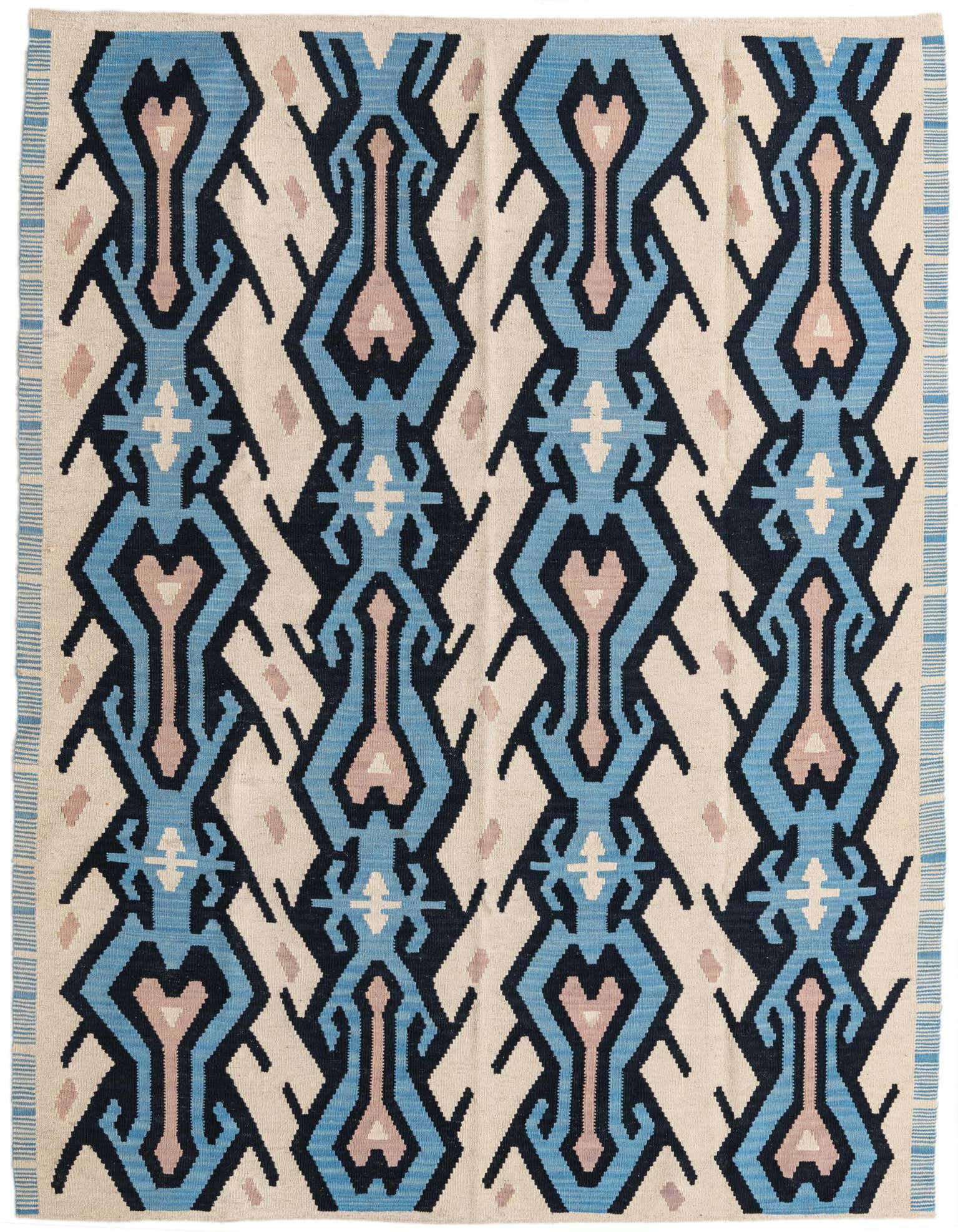A 6x9 rectangular ivory flatweave rug with a bold tribal pattern in shades of blue, black, and blush.