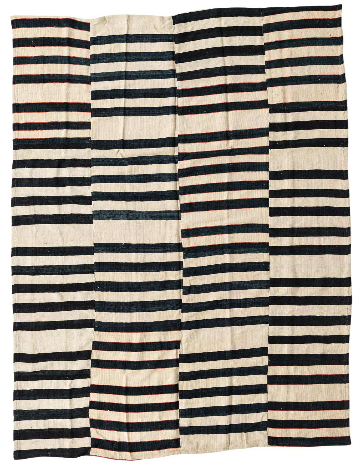 A 5x8 rectangular Kilim Patchwork rug with alternating ivory and black horizontal stripes, showcasing a tribal, modern aesthetic.