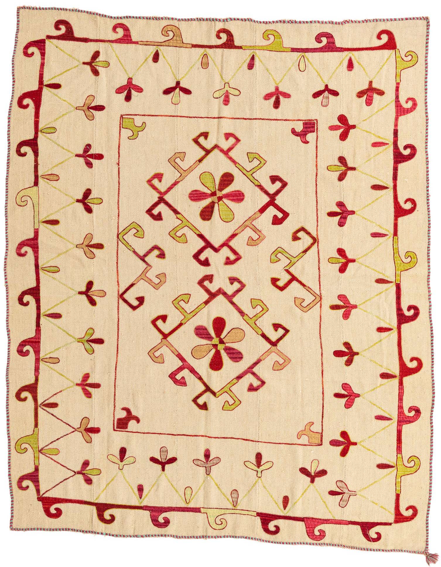 A 5x8 rectangular ivory Kilim Suzani rug with a tribal pattern in red, green, and peach tones.