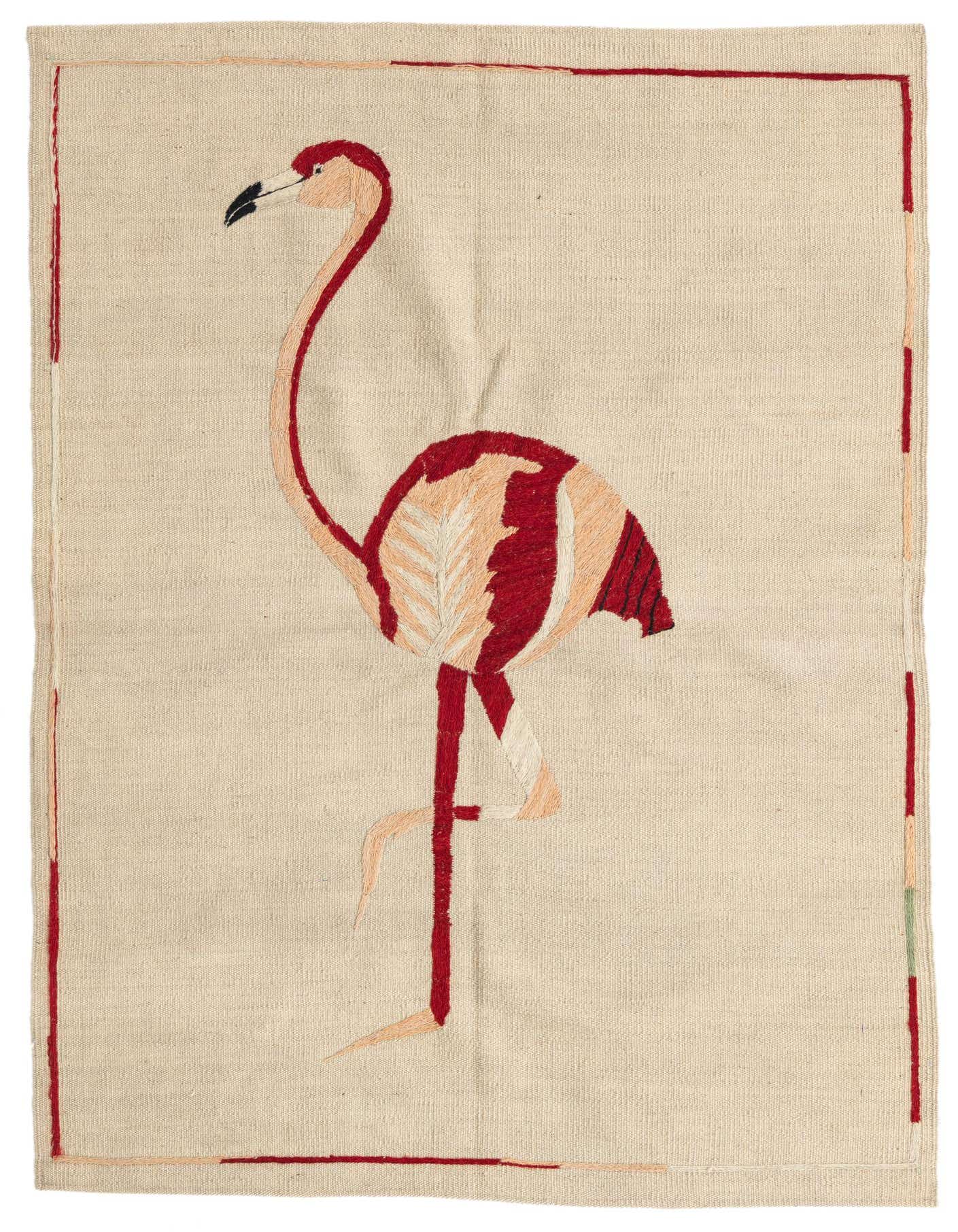 A 3x5 rectangular ivory flatweave rug with a large, stylized flamingo design in shades of red, pink, and cream.