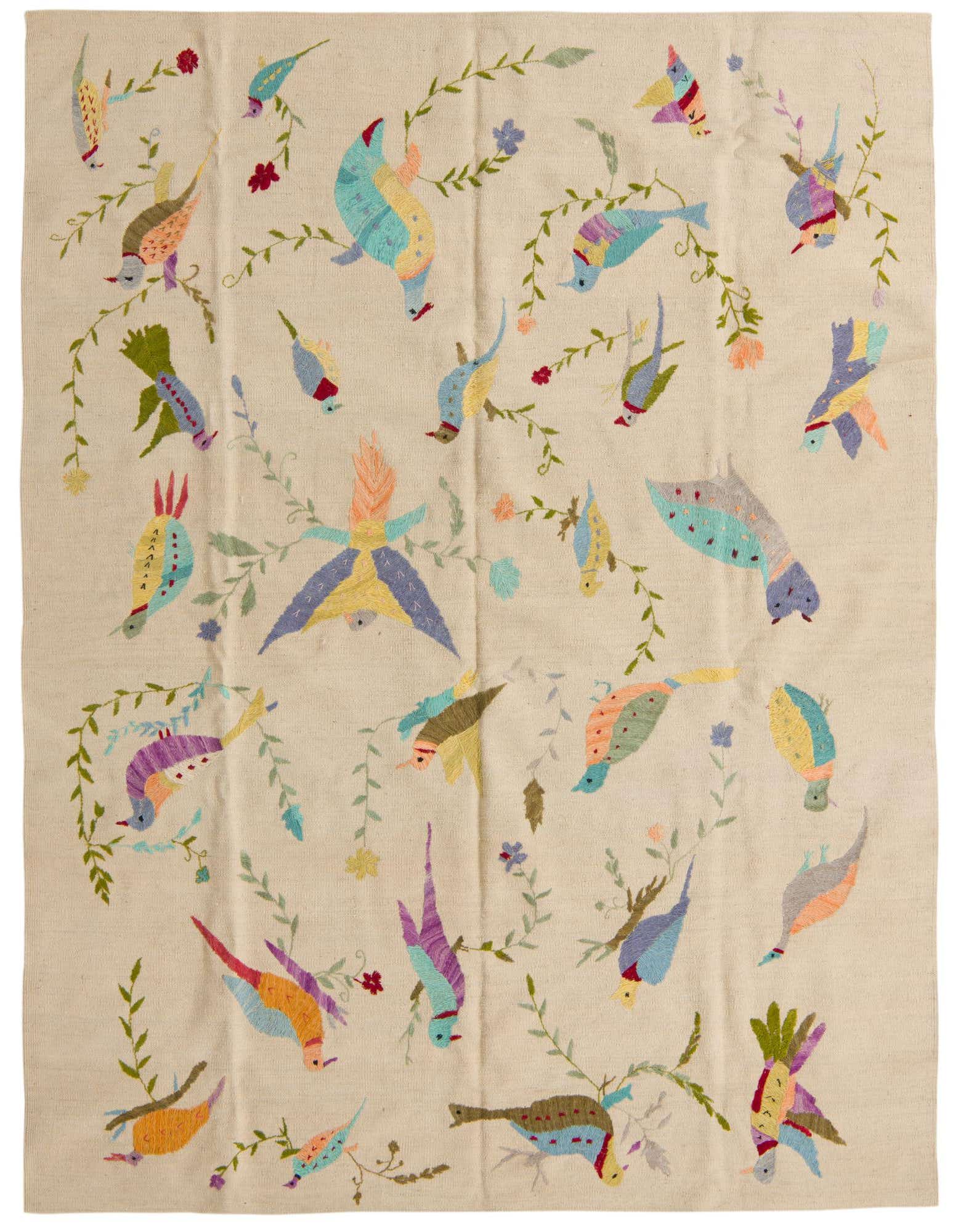 A 5x8 rectangular ivory flatweave rug featuring a vibrant, scattered tribal bird and floral pattern in various colors.