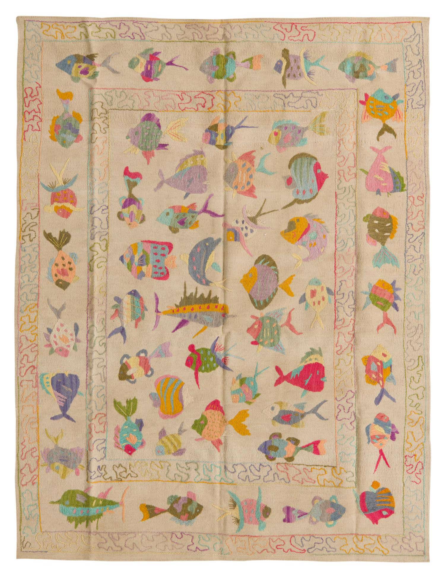 A 4x6 rectangular ivory flatweave rug with a colorful, whimsical fish pattern and a decorative border.