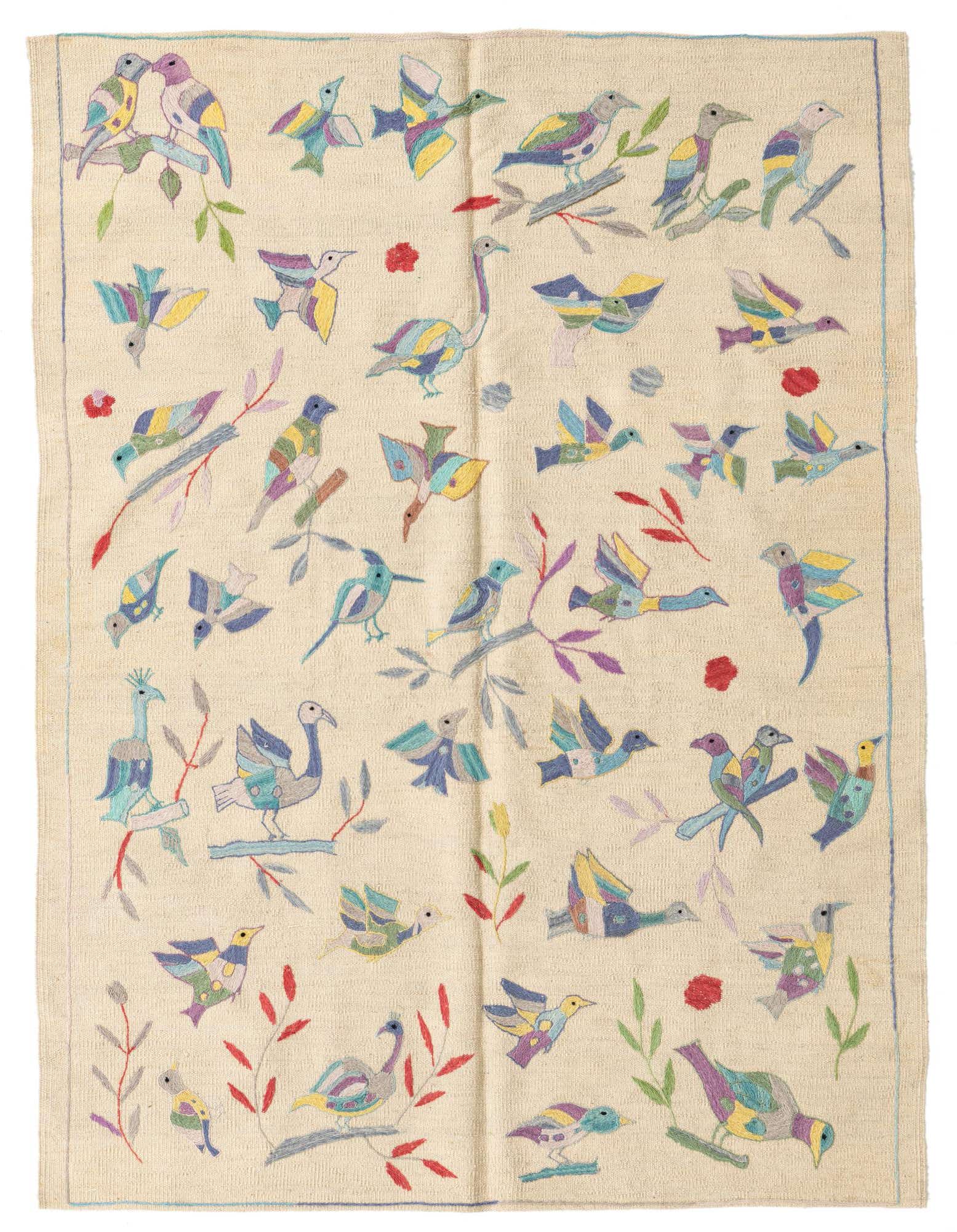 A 4x6 rectangular ivory flatweave rug featuring a colorful, whimsical pattern of various birds and branches.