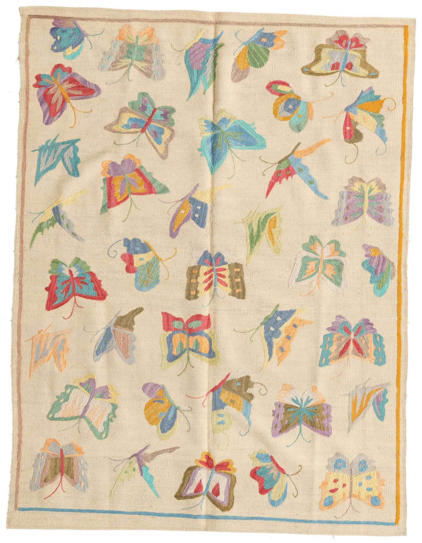 A 4x6 rectangular Kilim Suzani rug features a cream background with colorful embroidered butterflies in various sizes and hues, ideal for a living room.