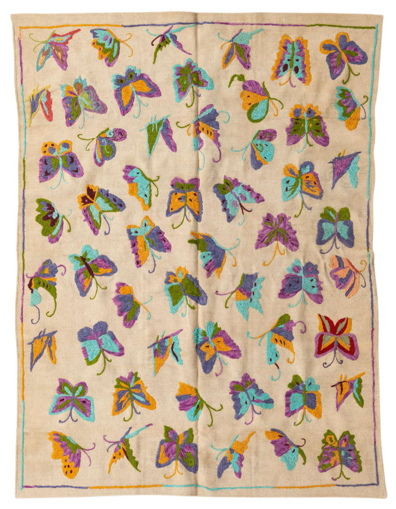 A 4x6 rectangular Kilim Suzani rug with an ivory background and colorful embroidered butterflies in purple, teal, green, and orange.