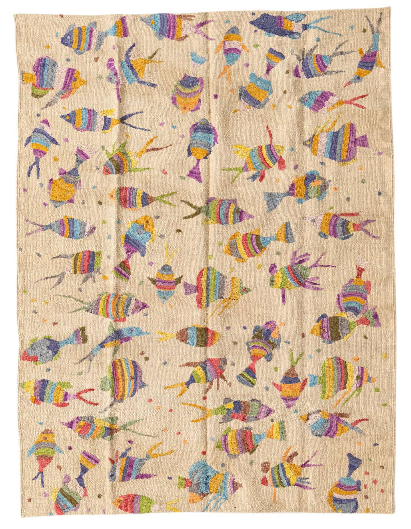 A 4x6 rectangular ivory flatweave wool rug featuring colorful tribal-style fish and dot patterns.