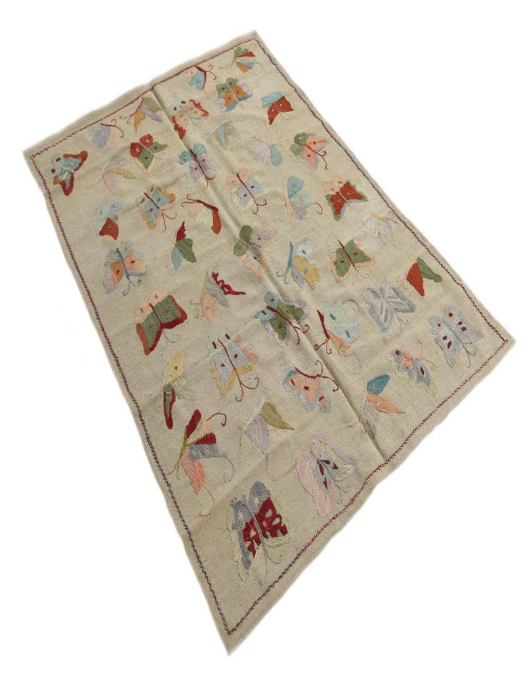 Detail image of  4' 3 x 5' 9  Hand Woven Kilim Suzani Wool Rug