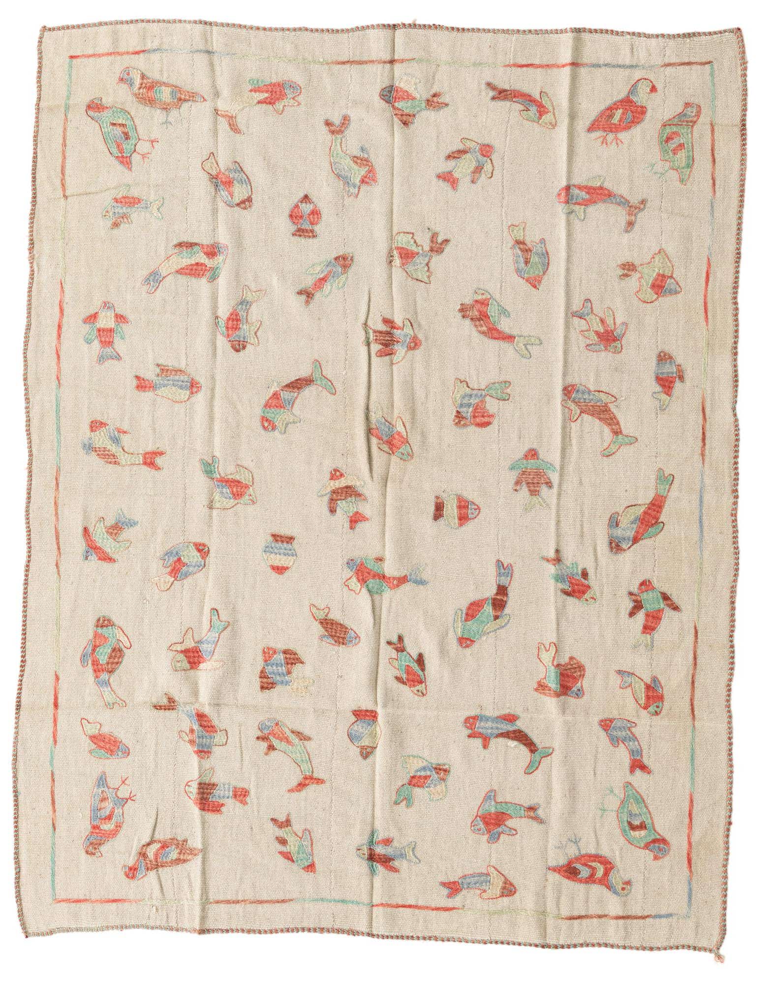 A 4x6 rectangular ivory flatweave rug with a tribal pattern of colorful fish and bird motifs in red, blue, and green.