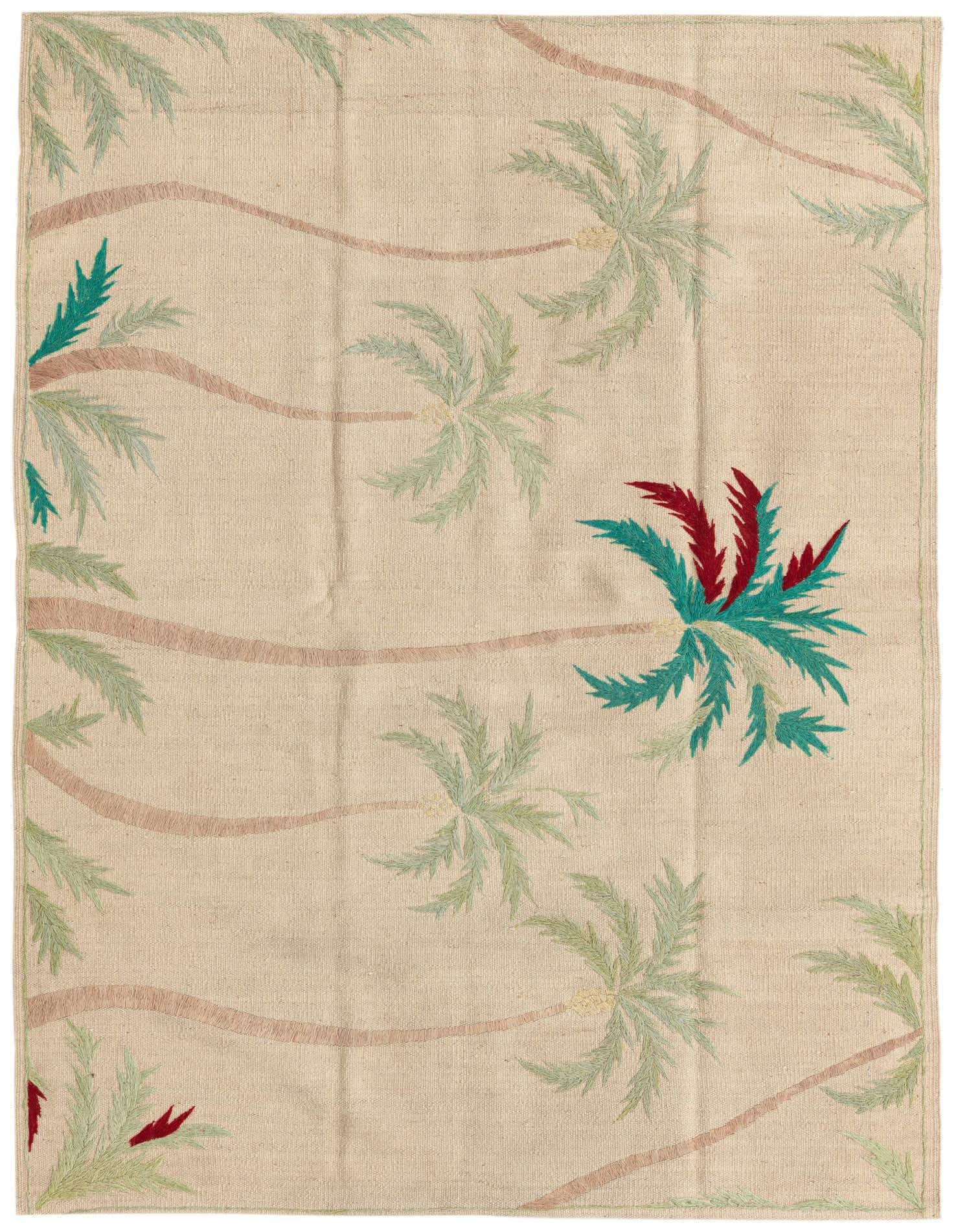 A 4x6 rectangular ivory flatweave rug with a tribal palm tree pattern in green, teal, and maroon.