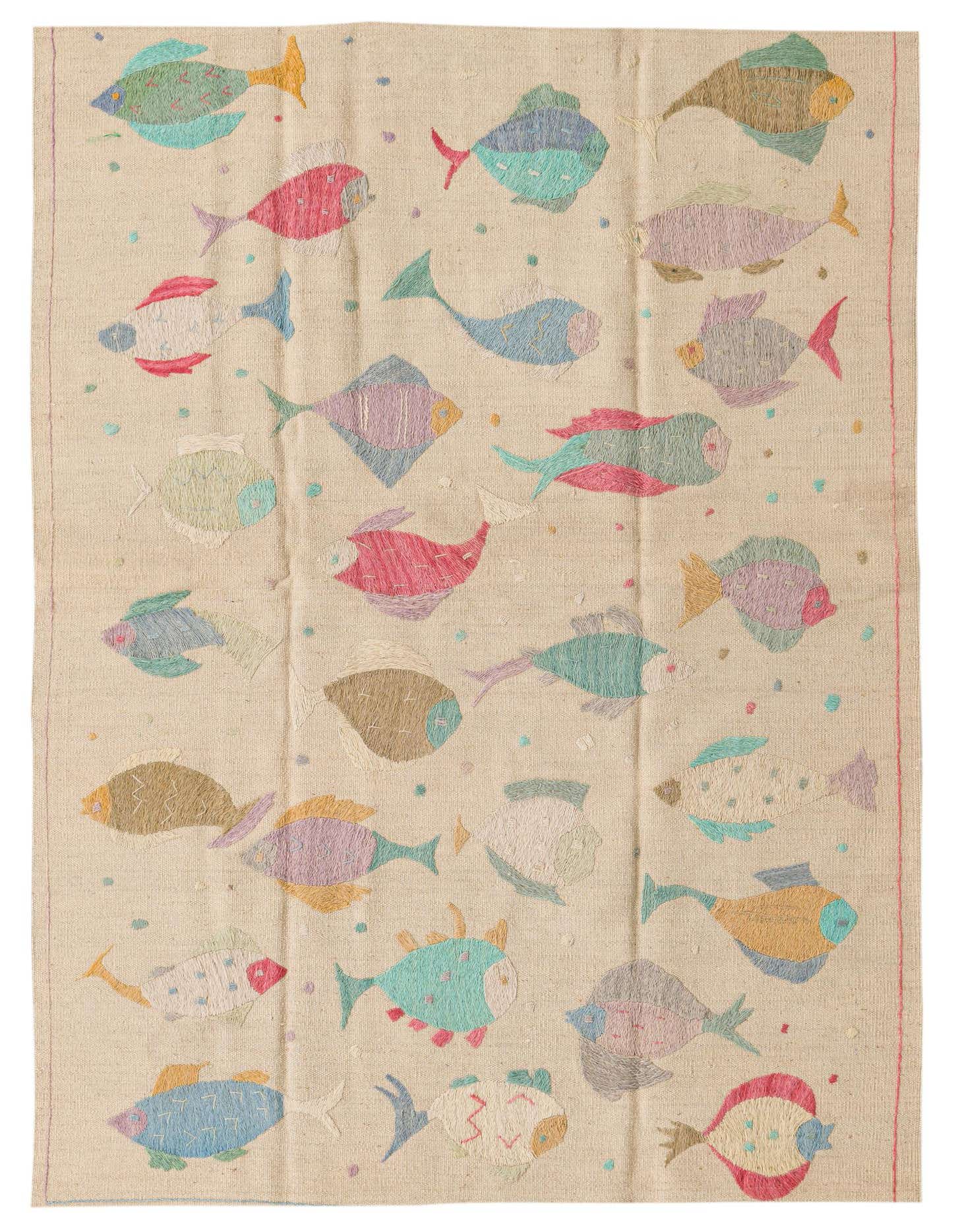 A 4x6 rectangular ivory flatweave rug with a colorful, whimsical fish pattern in various pastel shades.