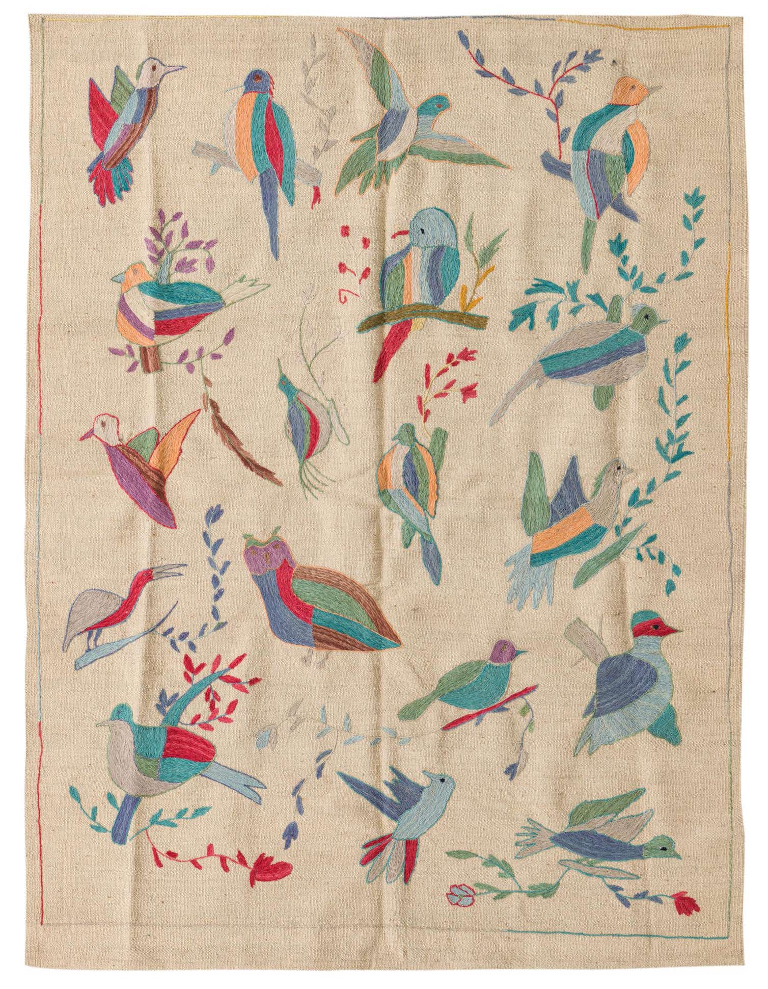 A 4x6 rectangular ivory flatweave wool rug featuring a vibrant, multicolored tribal bird and botanical pattern.