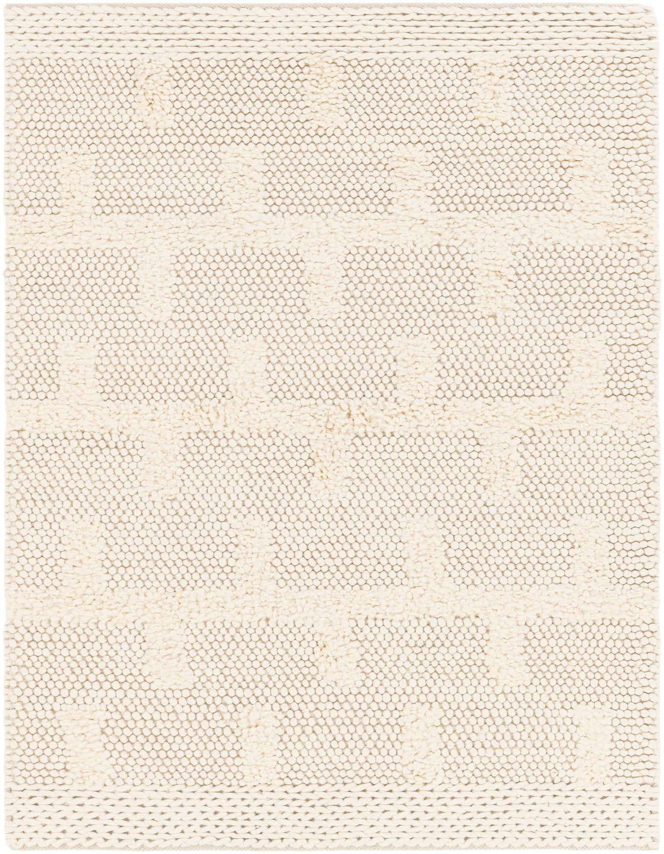 A rectangular 4x6 ivory and cream wool rug with a textured, high pile and subtle geometric pattern, suitable for various indoor rooms.