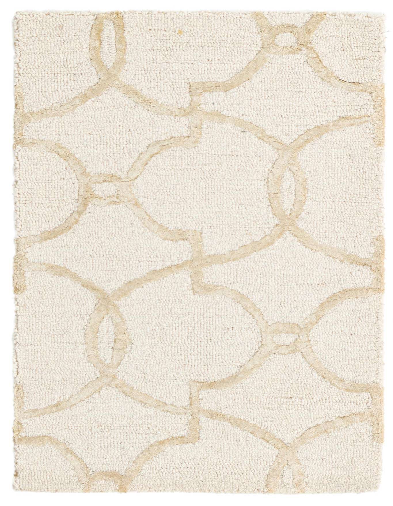 A 2x3 rectangular ivory and cream modern area rug with a high pile and geometric pattern.