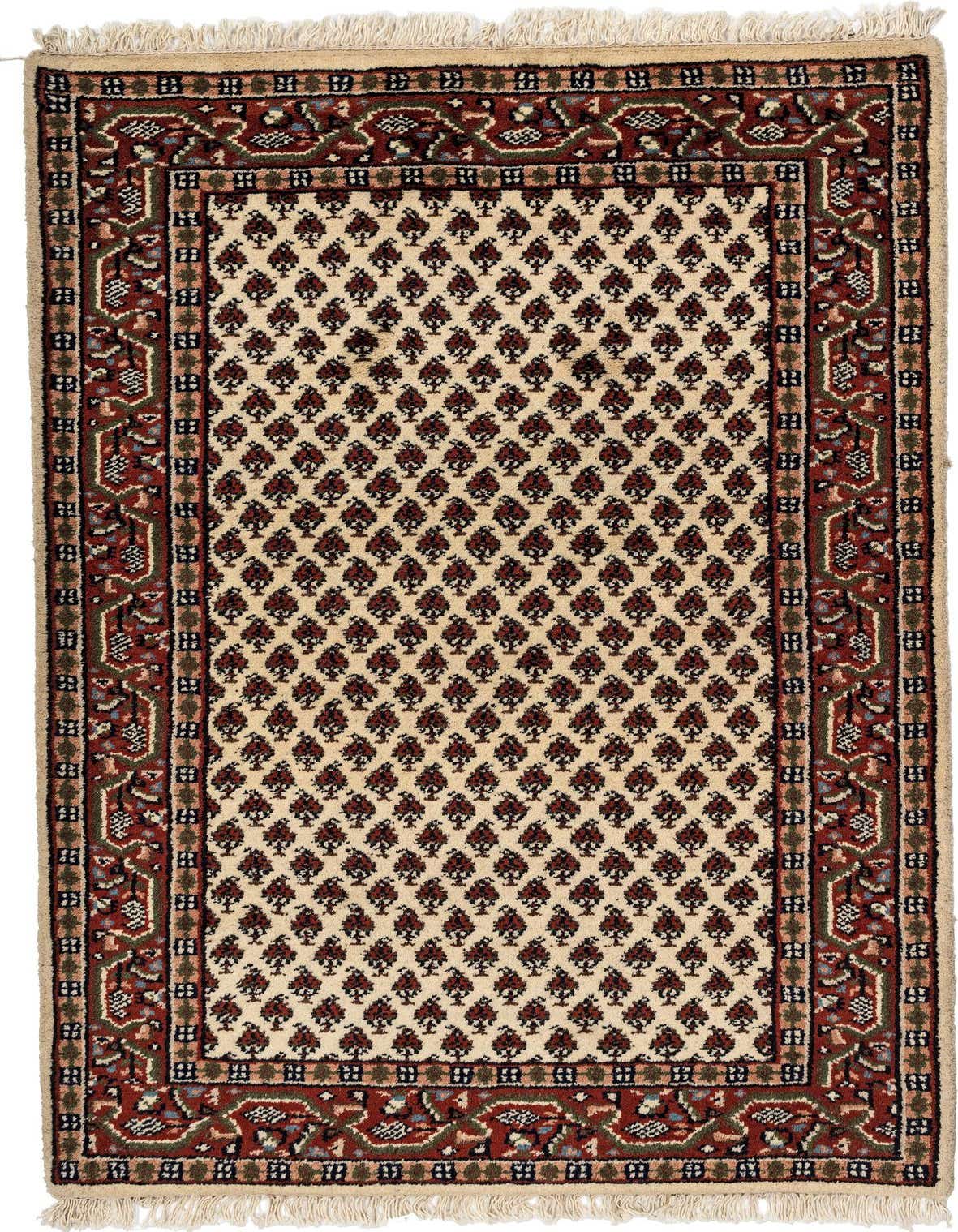 A 3x5 rectangular ivory and red traditional wool rug with an intricate oriental pattern and fringe.