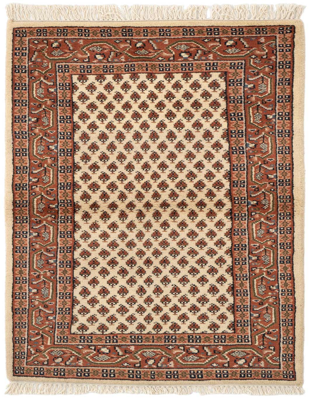 A 3x5 rectangular ivory and terracotta wool rug with a traditional Oriental pattern and fringed edges.