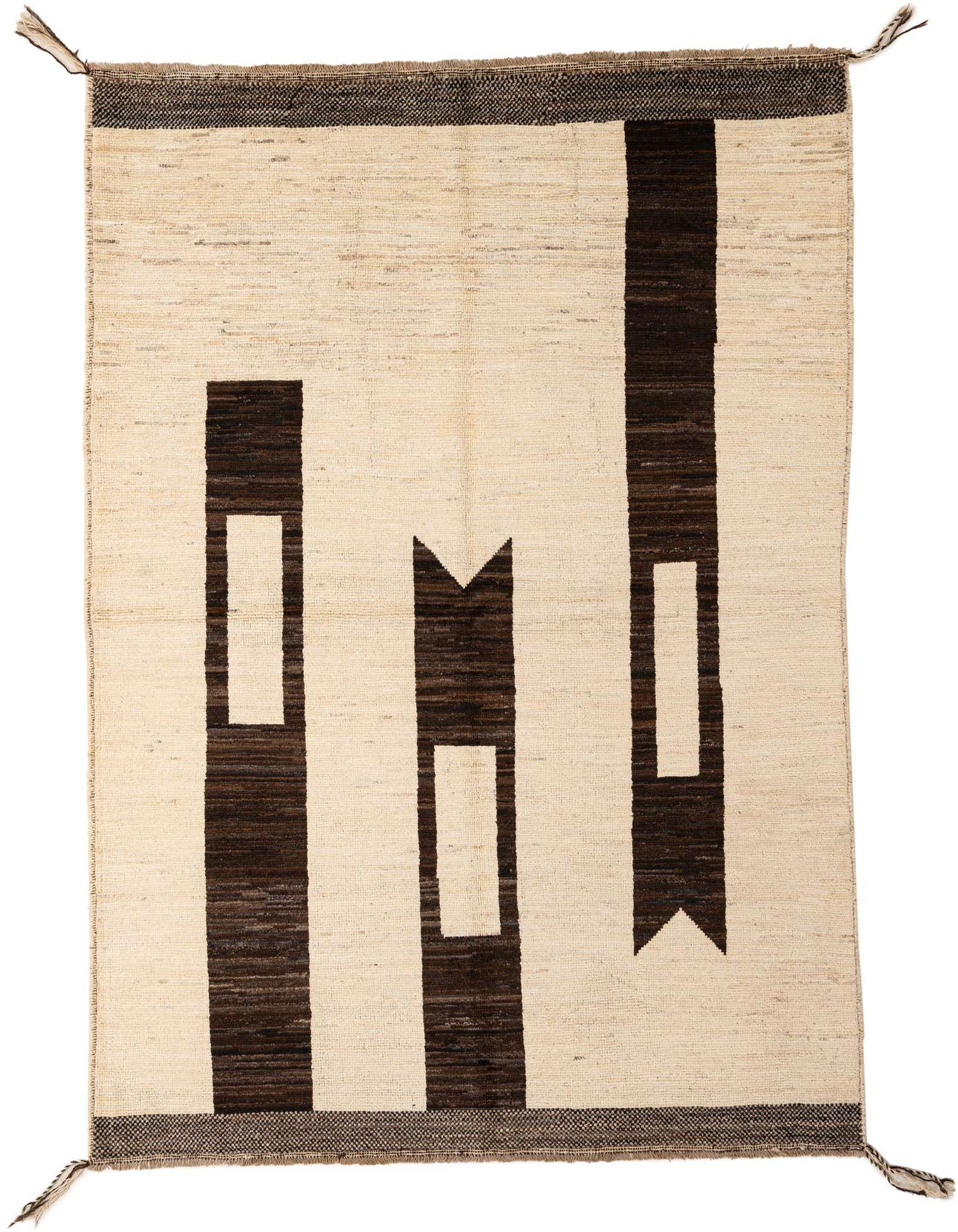 A 5x8 rectangular ivory and brown tribal wool rug with abstract geometric patterns and tassels.