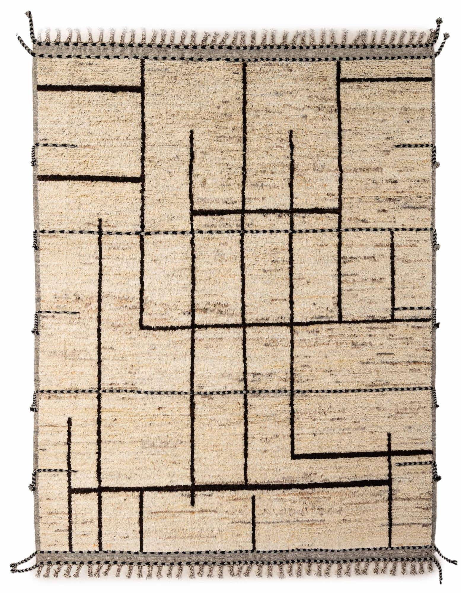 An 8x10 rectangular ivory wool rug with a modern tribal pattern of thick black lines and decorative tassels.