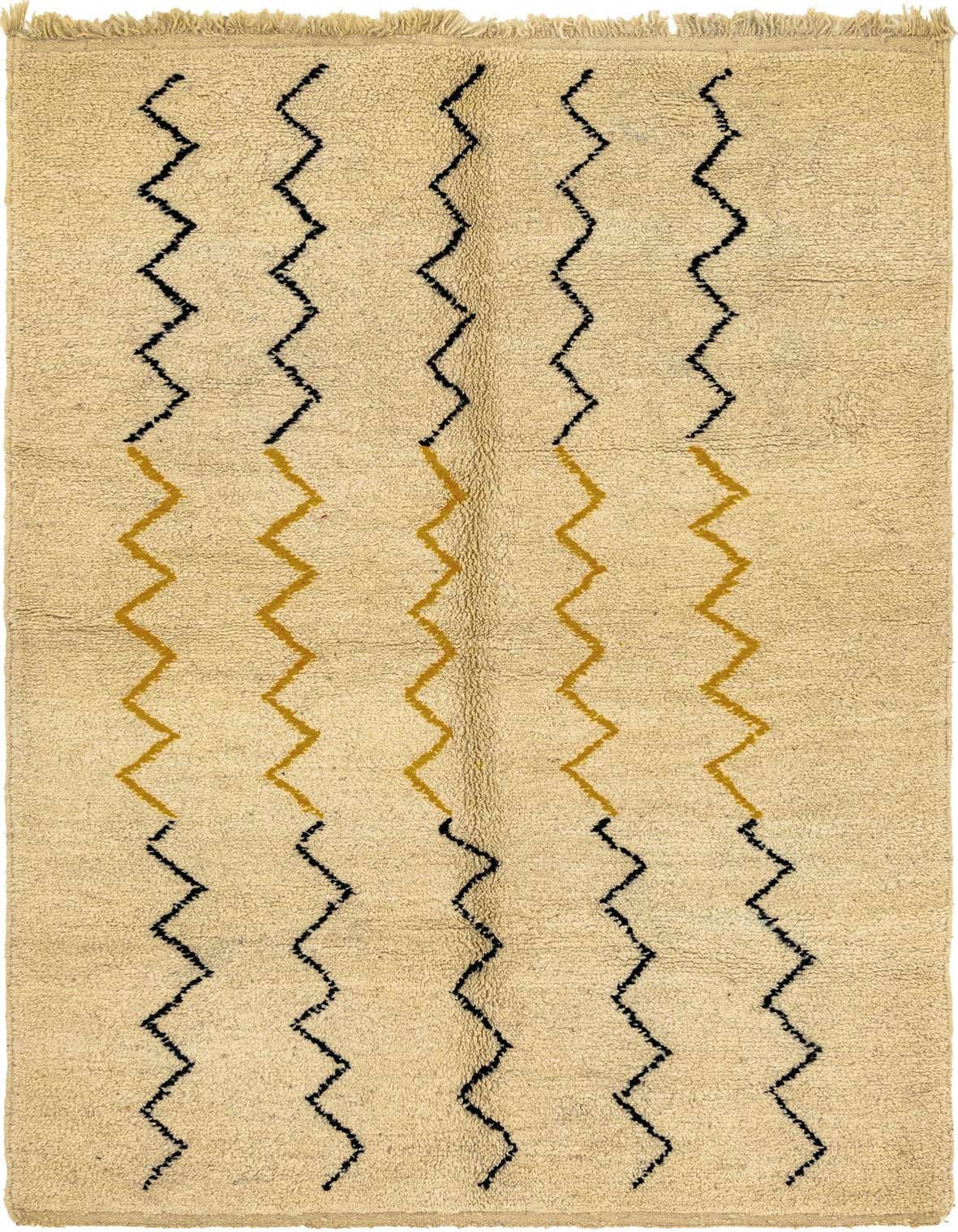 A 5x8 rectangular ivory shag rug with vertical black and gold zigzag tribal patterns, ideal for a living room.