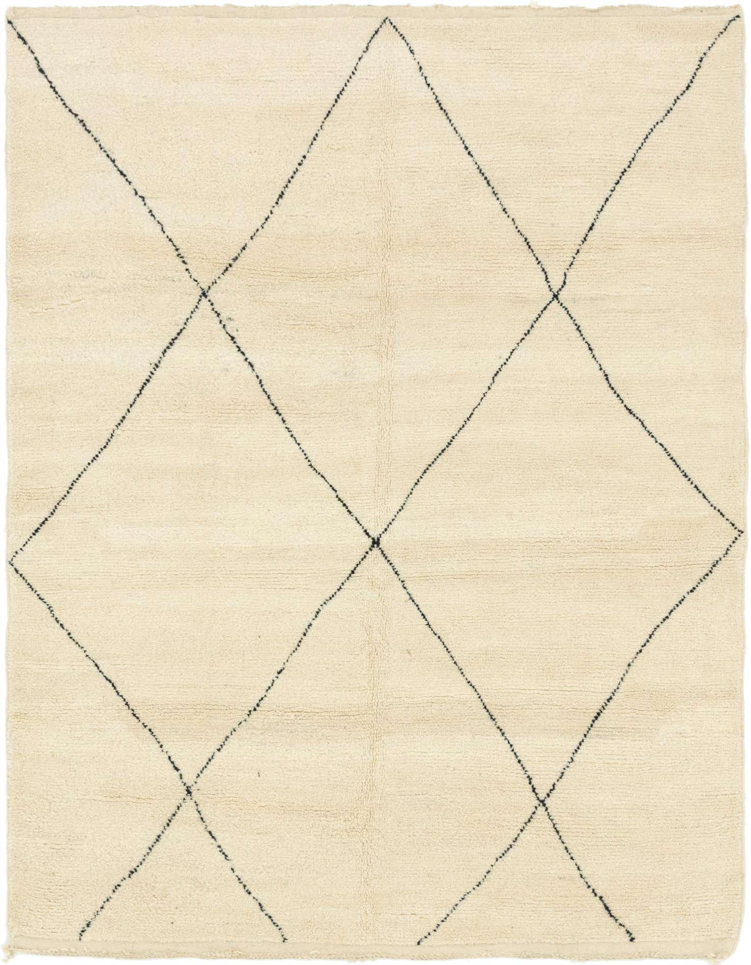 A 7x10 rectangular ivory shag rug with a black tribal diamond pattern, ideal for a living room.