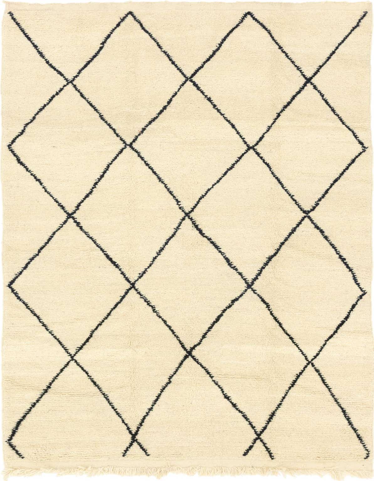 A 6x9 rectangular ivory shag rug with a bold black diamond pattern, ideal for a modern living room.