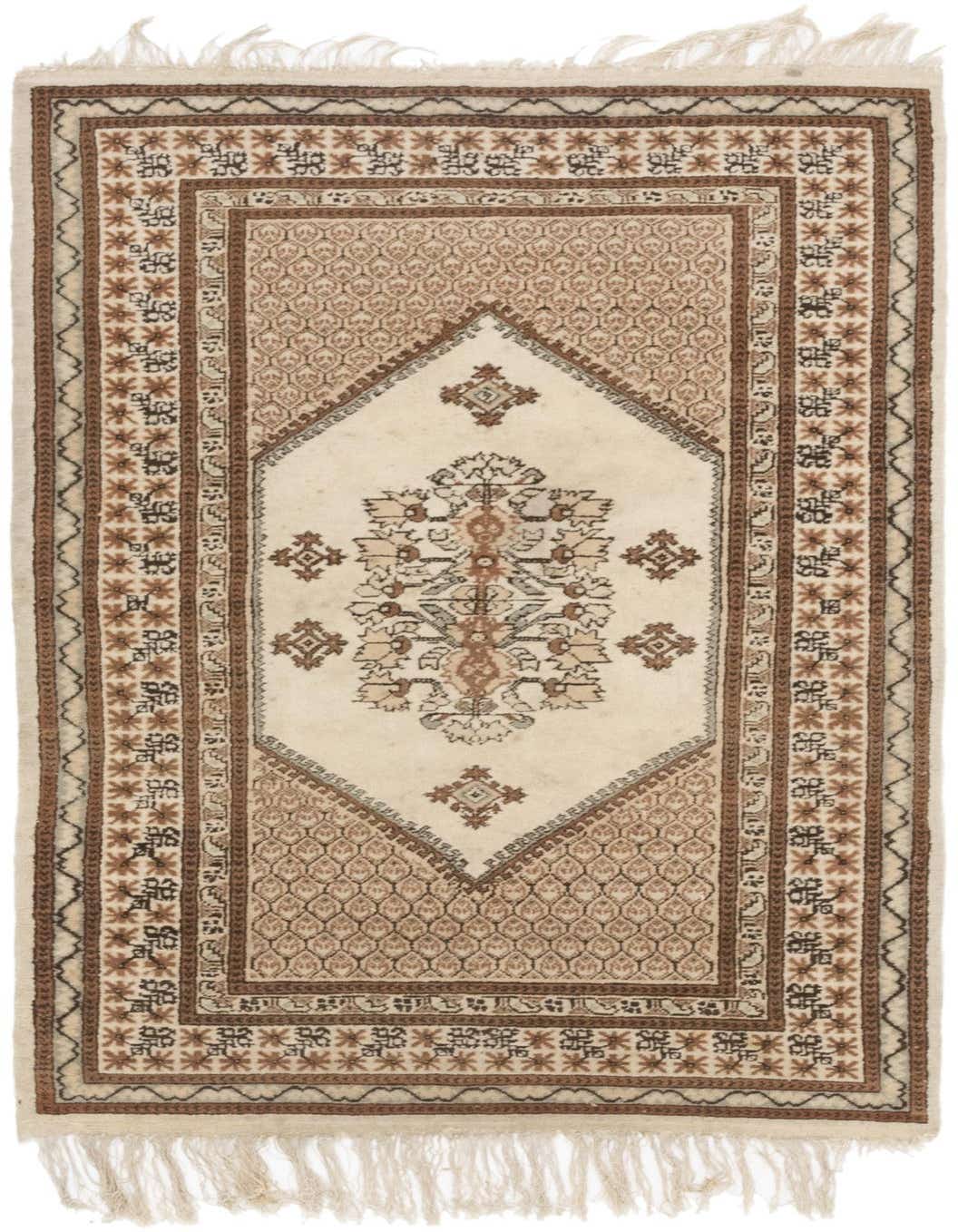 A 3x5 rectangular ivory wool rug with a traditional tribal medallion pattern in brown and cream, featuring fringe.