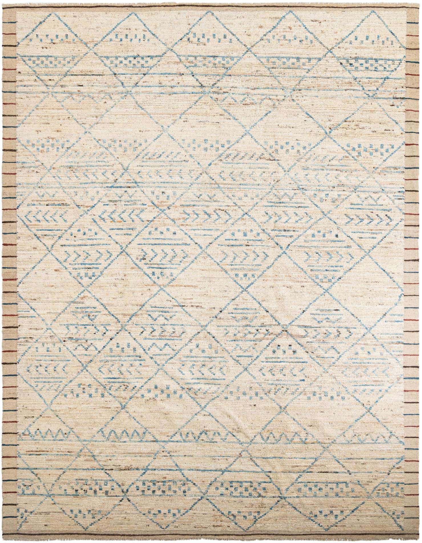 A 10x14 rectangular ivory wool shag rug with a modern tribal pattern of blue geometric diamonds and abstract lines.