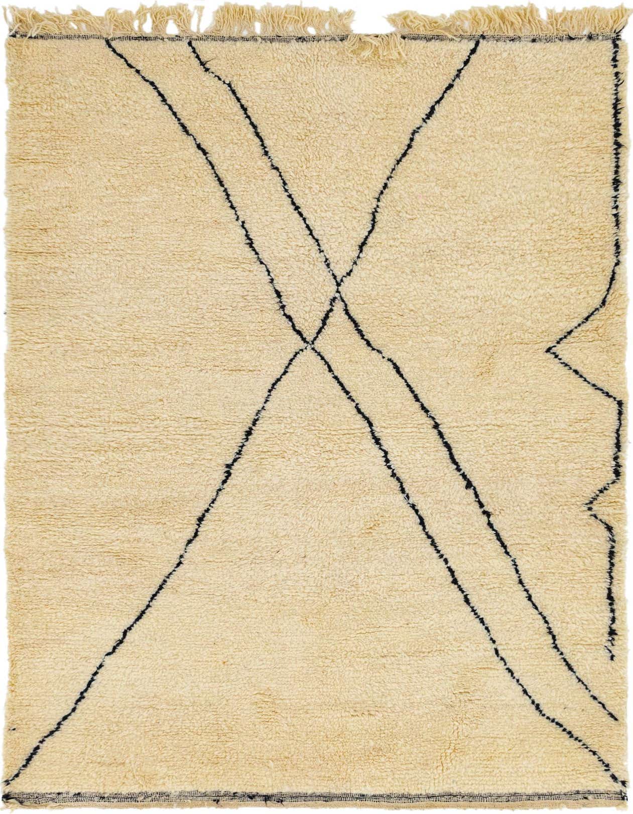 A rectangular 5x8 ivory shag rug with abstract black tribal lines forming an X pattern, suitable for a living room.