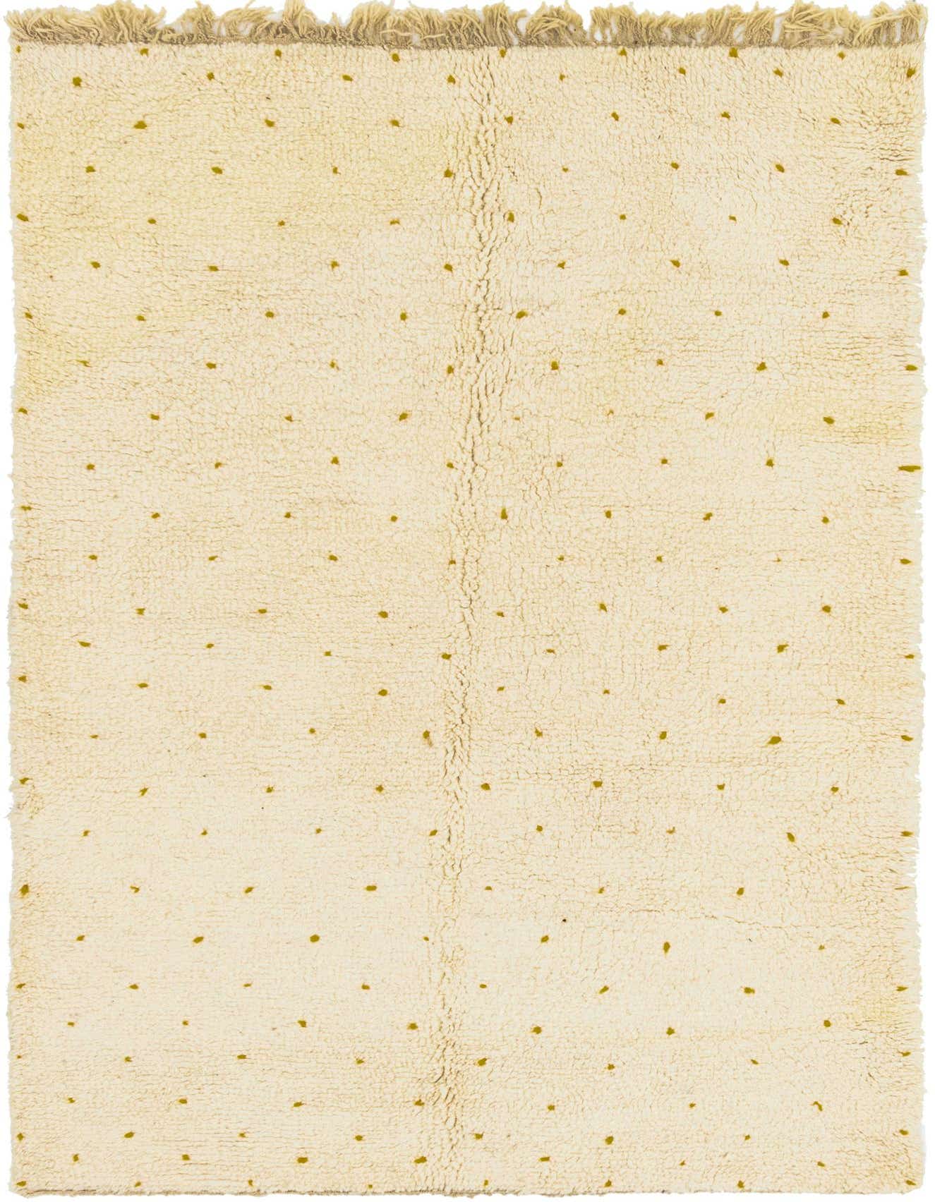 A 5x8 rectangular ivory shag rug with small, scattered olive green dots, featuring fringed ends.