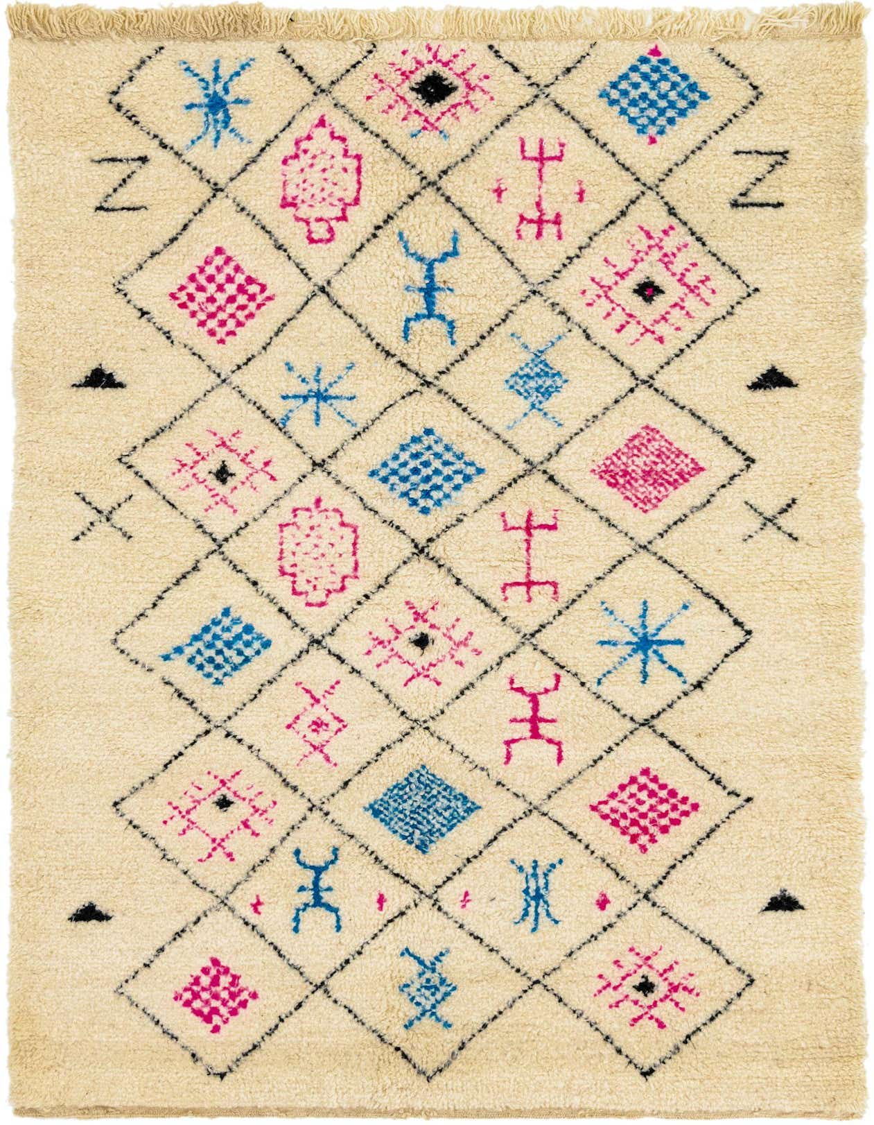 A 5x8 rectangular ivory shag rug with a black diamond lattice pattern filled with colorful tribal motifs in blue, pink, and black.