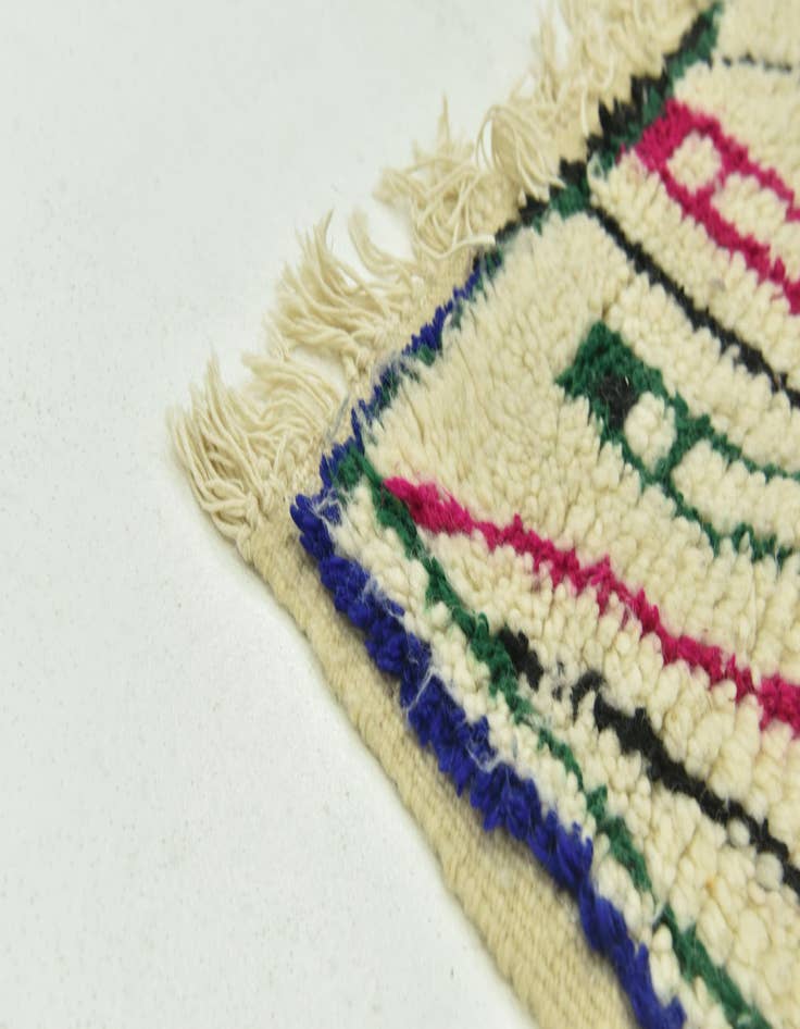 Detail image of  4' 7 x 9'  Hand Knotted Moroccan Wool Rug