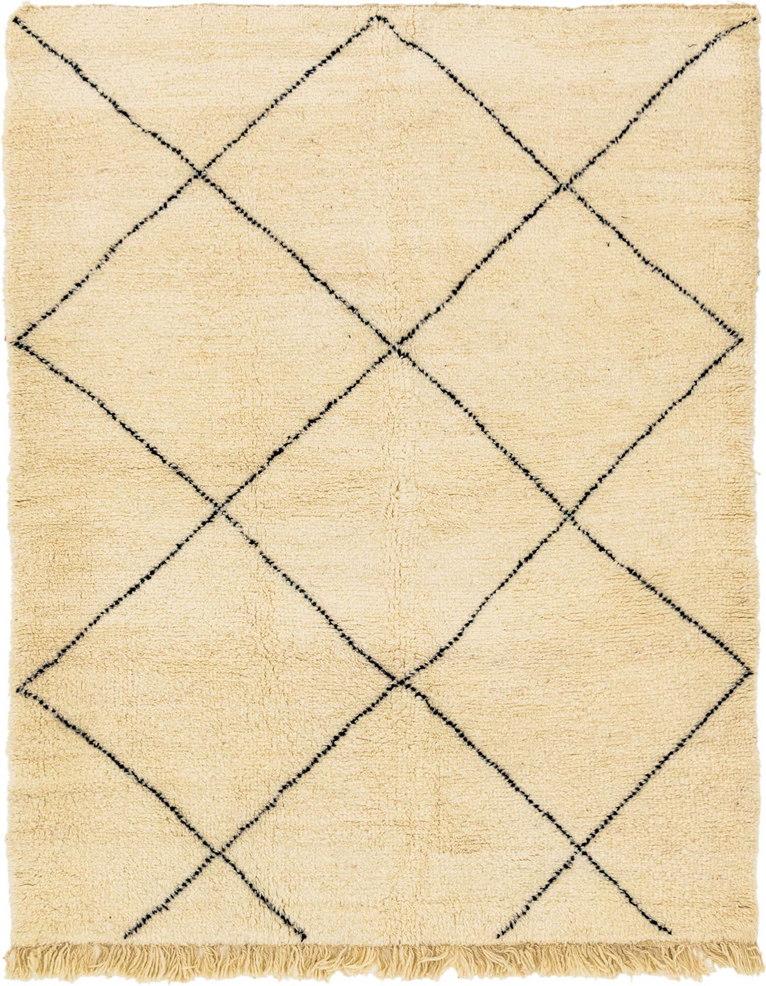 A 6x9 rectangular ivory shag rug with a black tribal diamond pattern and fringe, perfect for a living room.