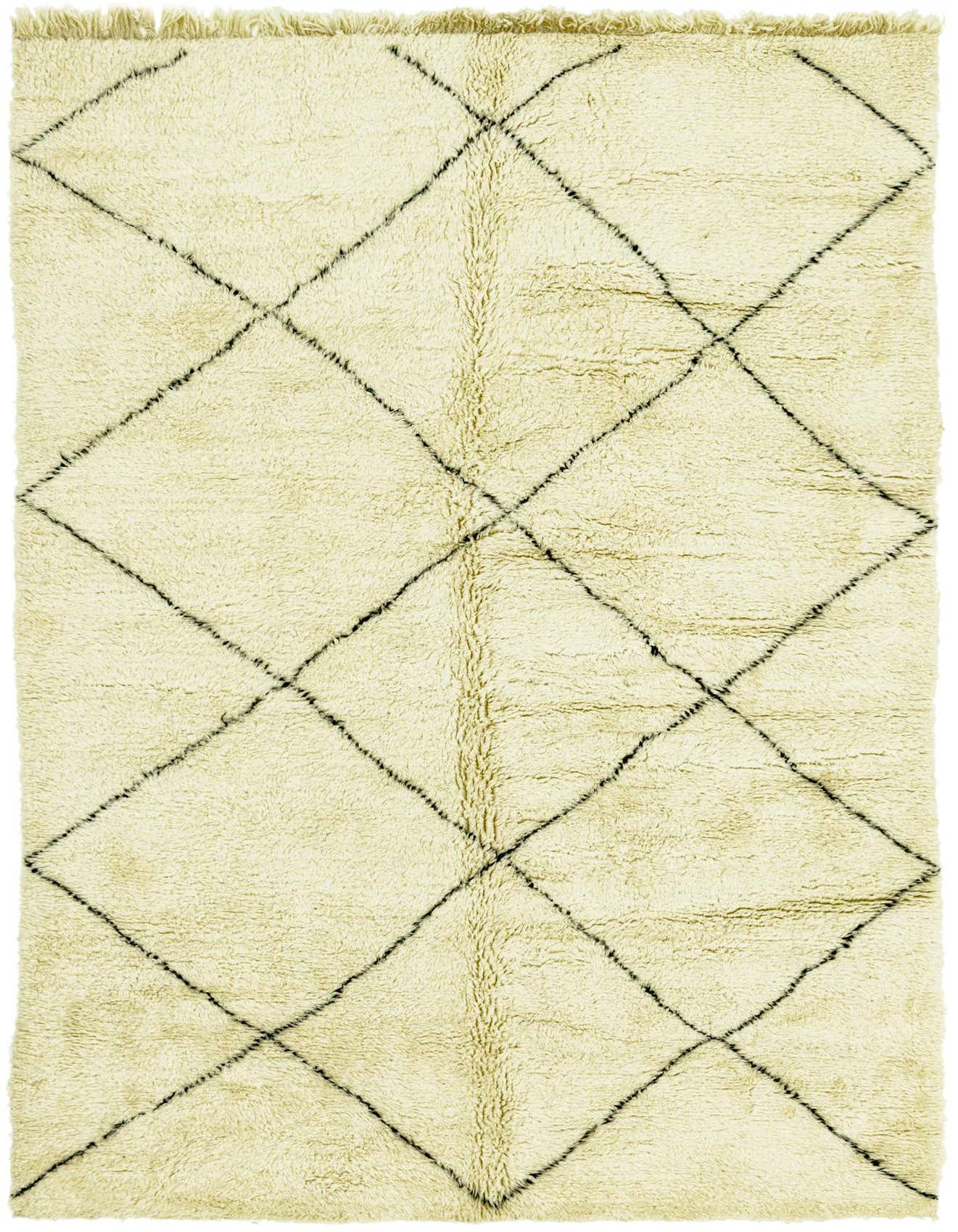 A 7x10 rectangular ivory shag rug with a black tribal diamond pattern, ideal for a modern living room.