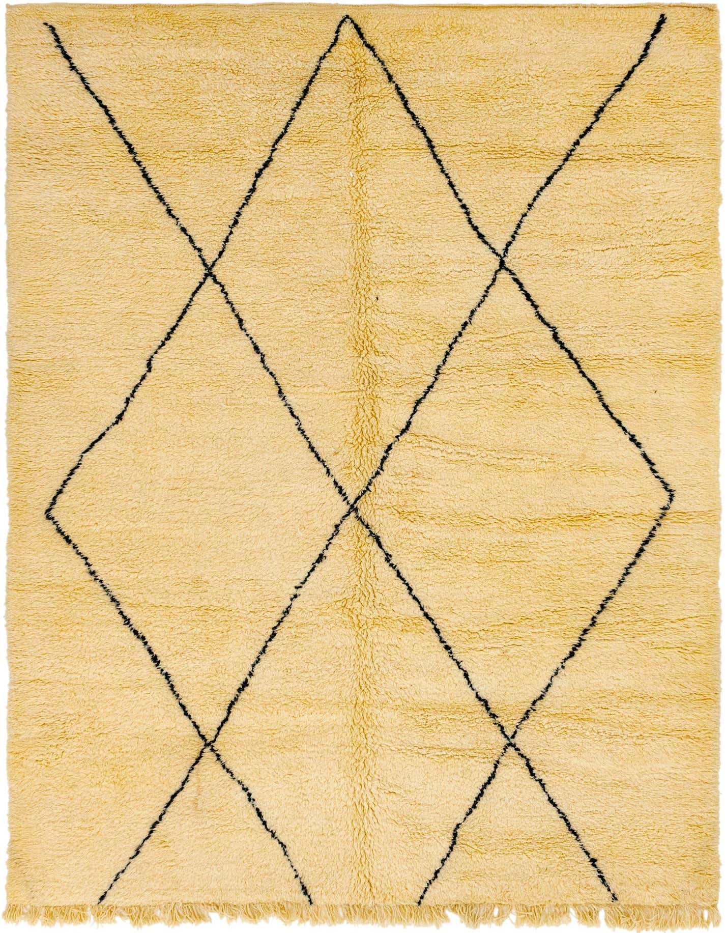 A rectangular 8x12 ivory shag rug with a black tribal diamond pattern, featuring a soft, plush texture.