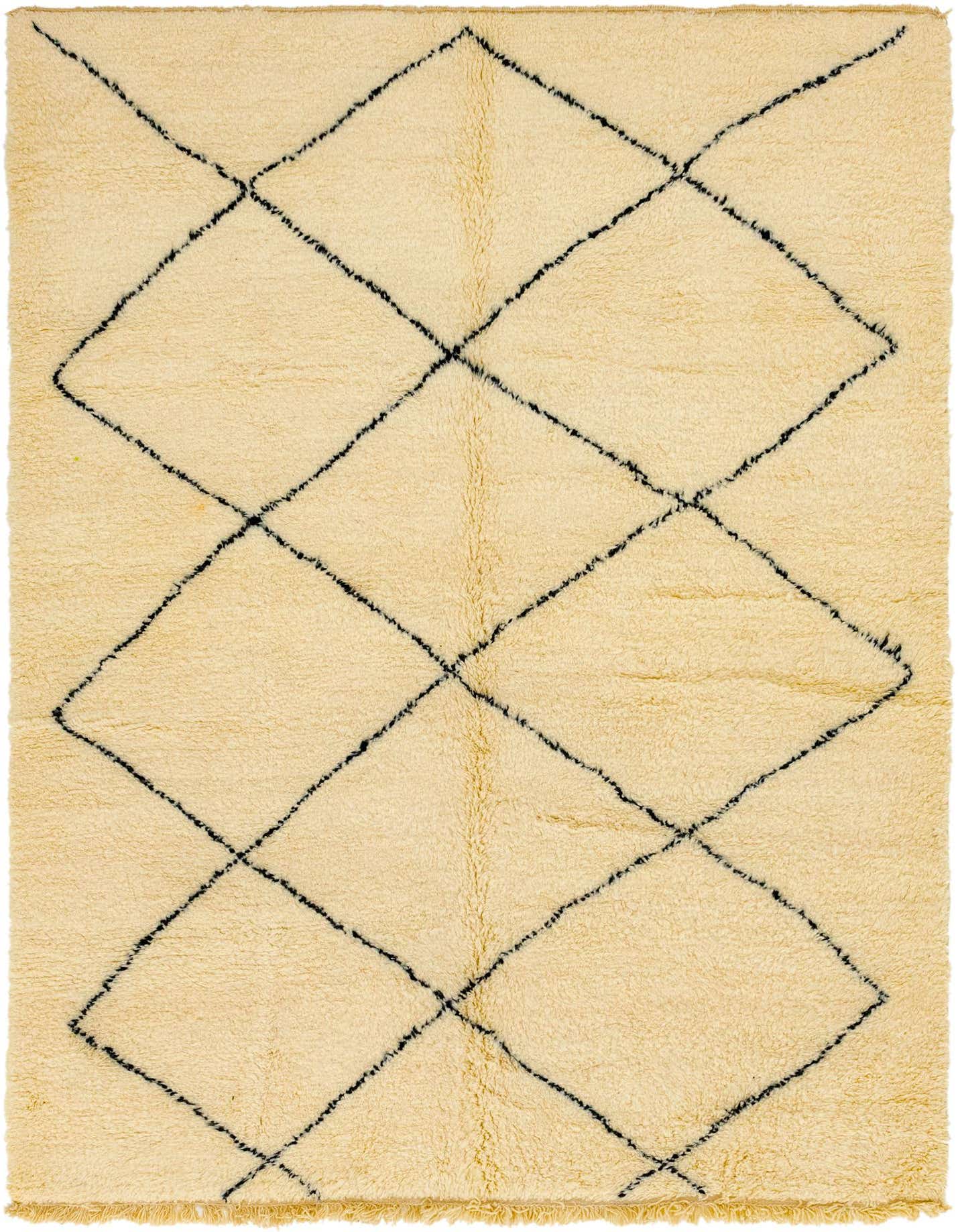 A 7x10 rectangular ivory shag rug with a black tribal diamond pattern, ideal for a living room or bedroom.