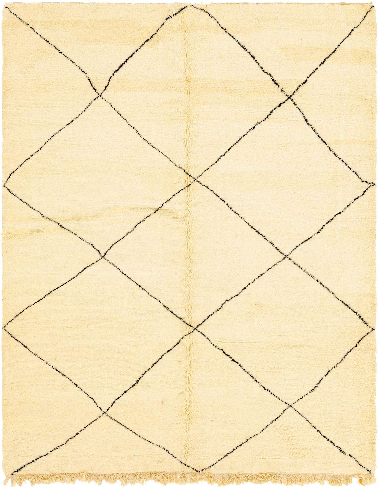 A 7x10 rectangular ivory shag rug with a black tribal diamond pattern, ideal for a living room or bedroom.