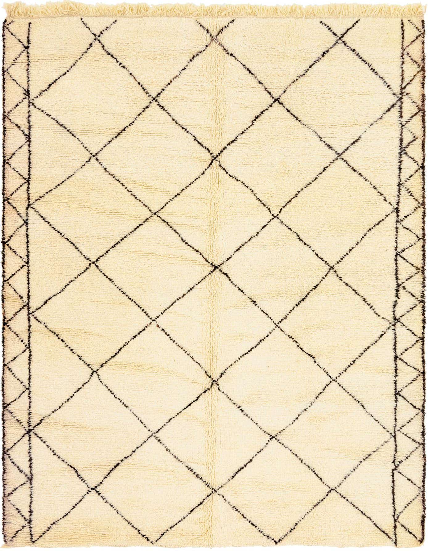 A 7x10 rectangular ivory shag rug with a black tribal diamond pattern and fringed edges, suitable for a living room.