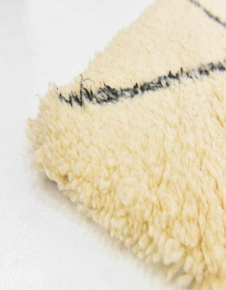 Detail image of  5' 3 x 8' 5  Hand Knotted Moroccan Wool Rug