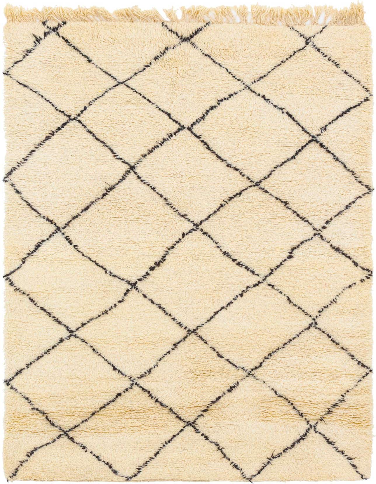 A 5x8 rectangular ivory shag rug with a black tribal diamond pattern and fringe, perfect for a living room.