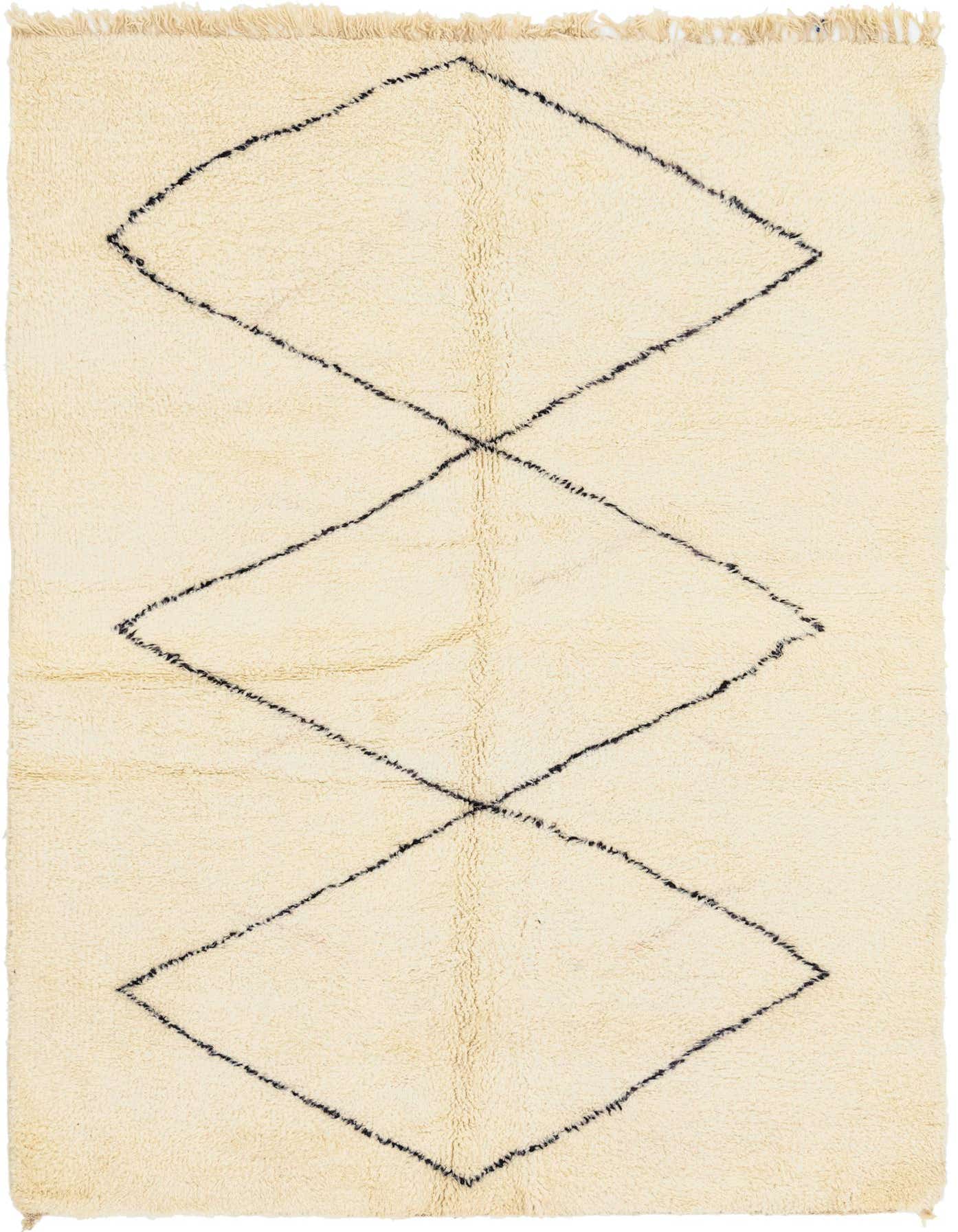 A 7x10 rectangular ivory shag rug featuring large black tribal diamond patterns, suitable for a living room.