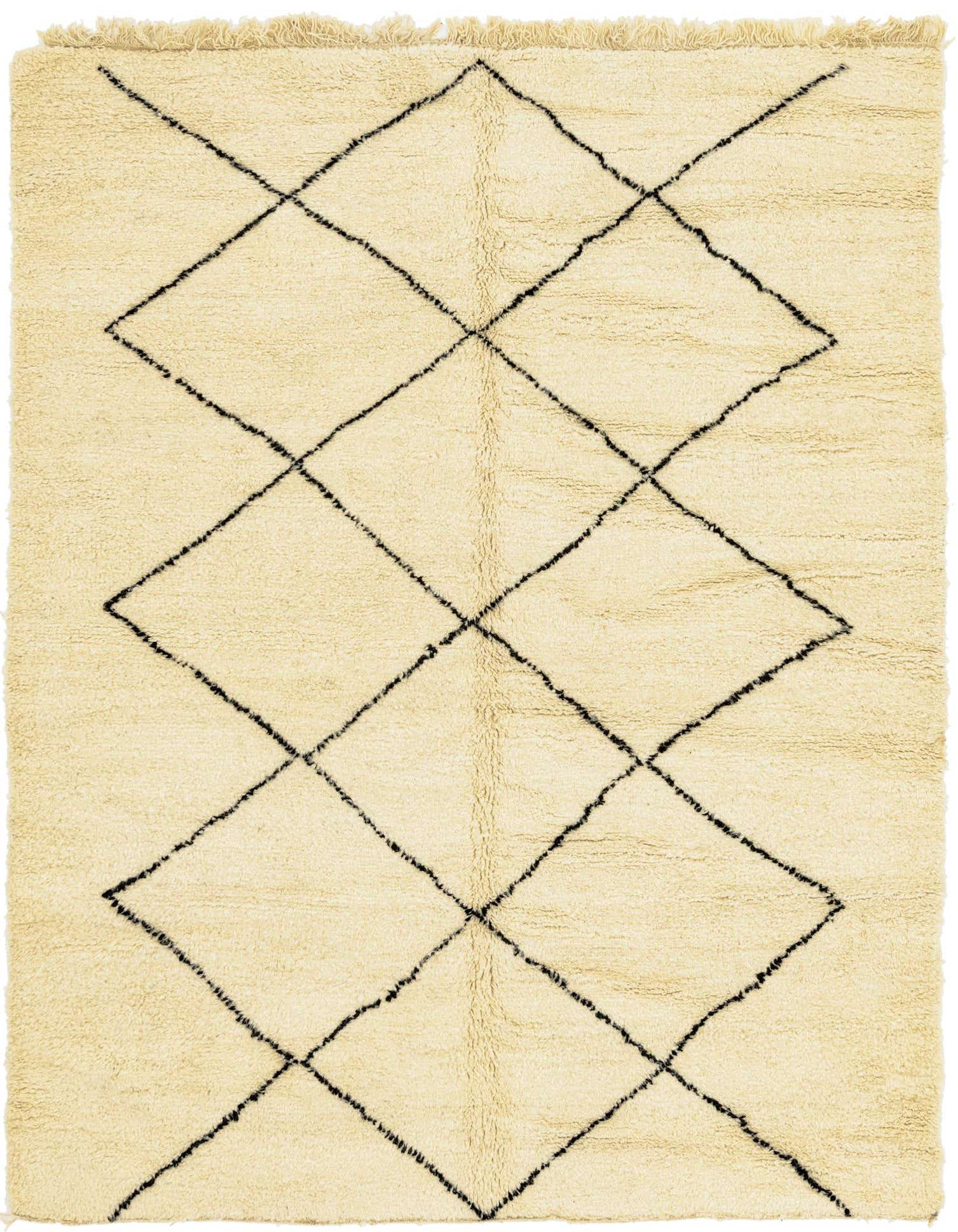 A rectangular 7x10 ivory shag rug with a bold black tribal diamond pattern, ideal for a living room.