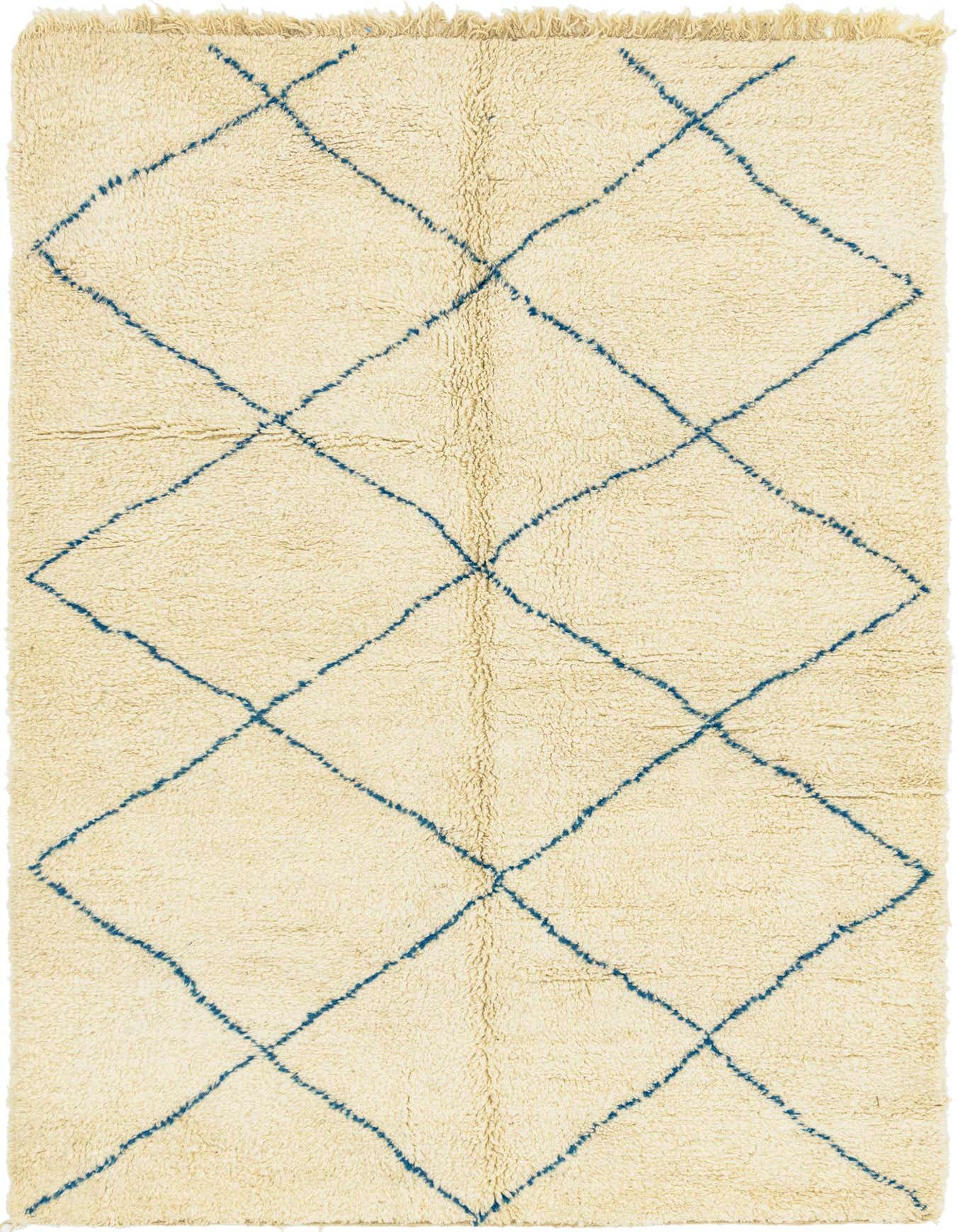 A rectangular 6x9 ivory shag rug with a blue tribal diamond pattern, ideal for a living room or bedroom.