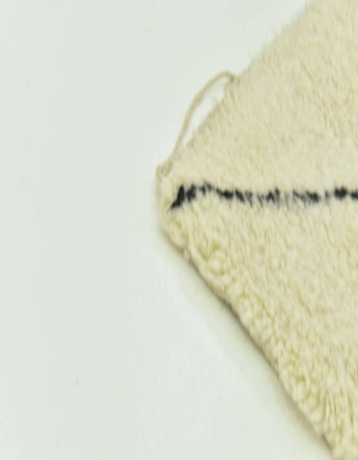 Detail image of  6' 6 x 9' 10  Hand Knotted Moroccan Wool Rug