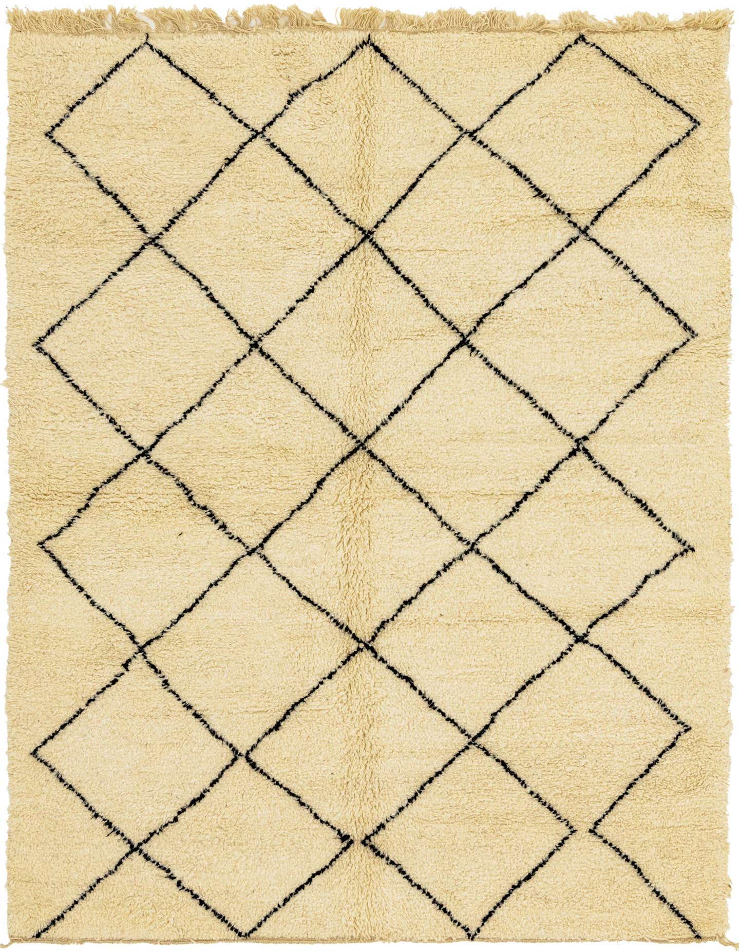 A 7x10 rectangular ivory shag rug with a black tribal diamond pattern, ideal for a living room.