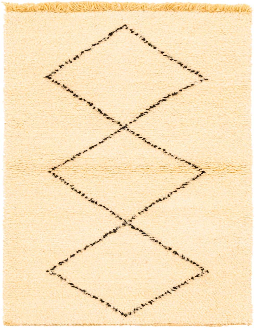 A 3x5 rectangular ivory shag rug with a modern tribal diamond pattern in black, featuring short fringes.